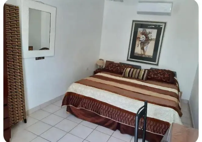 Bed in YOUR FIRST DAY Hotel on Aruba