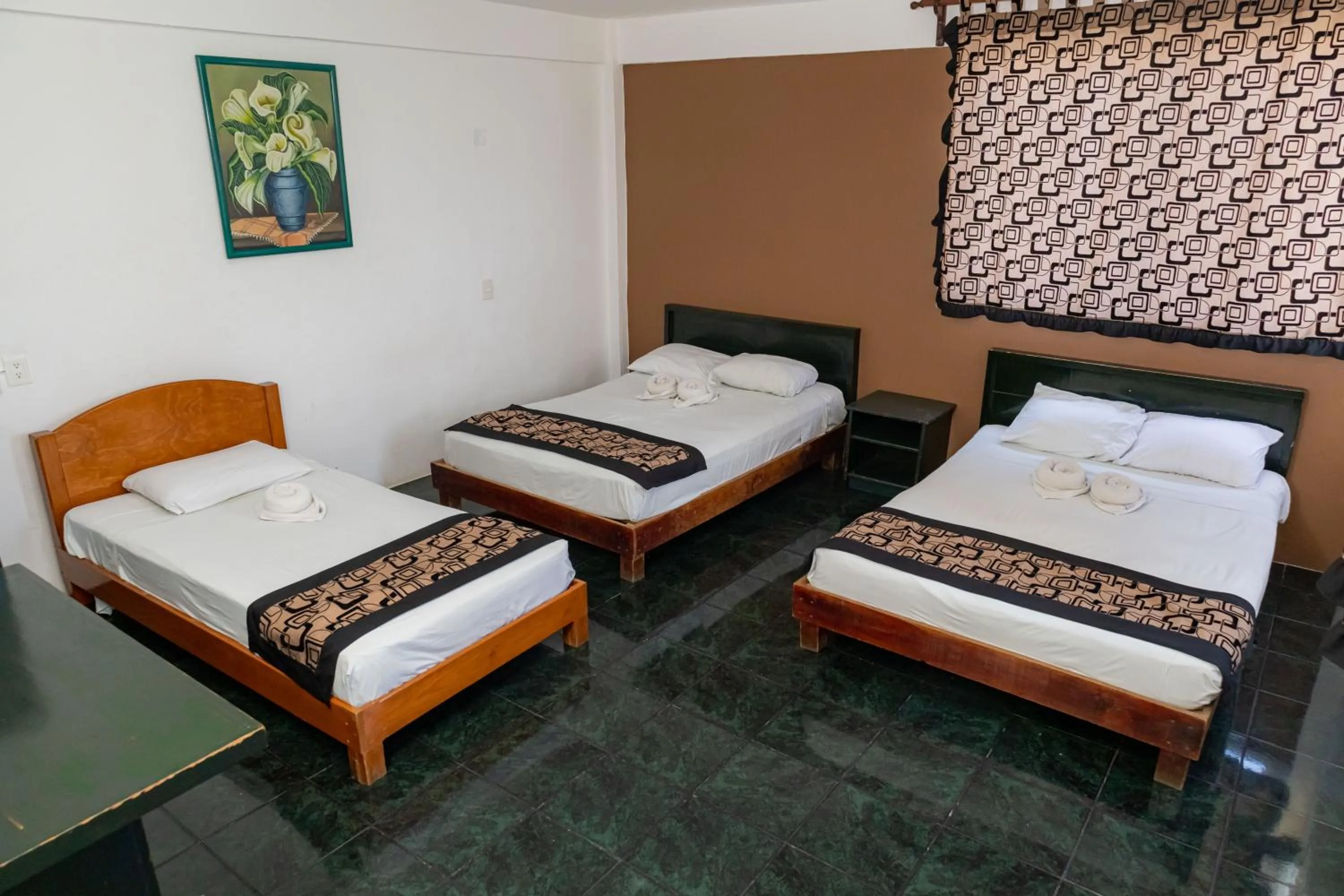 Bed in Hotel Las Palmas Cancun Centro