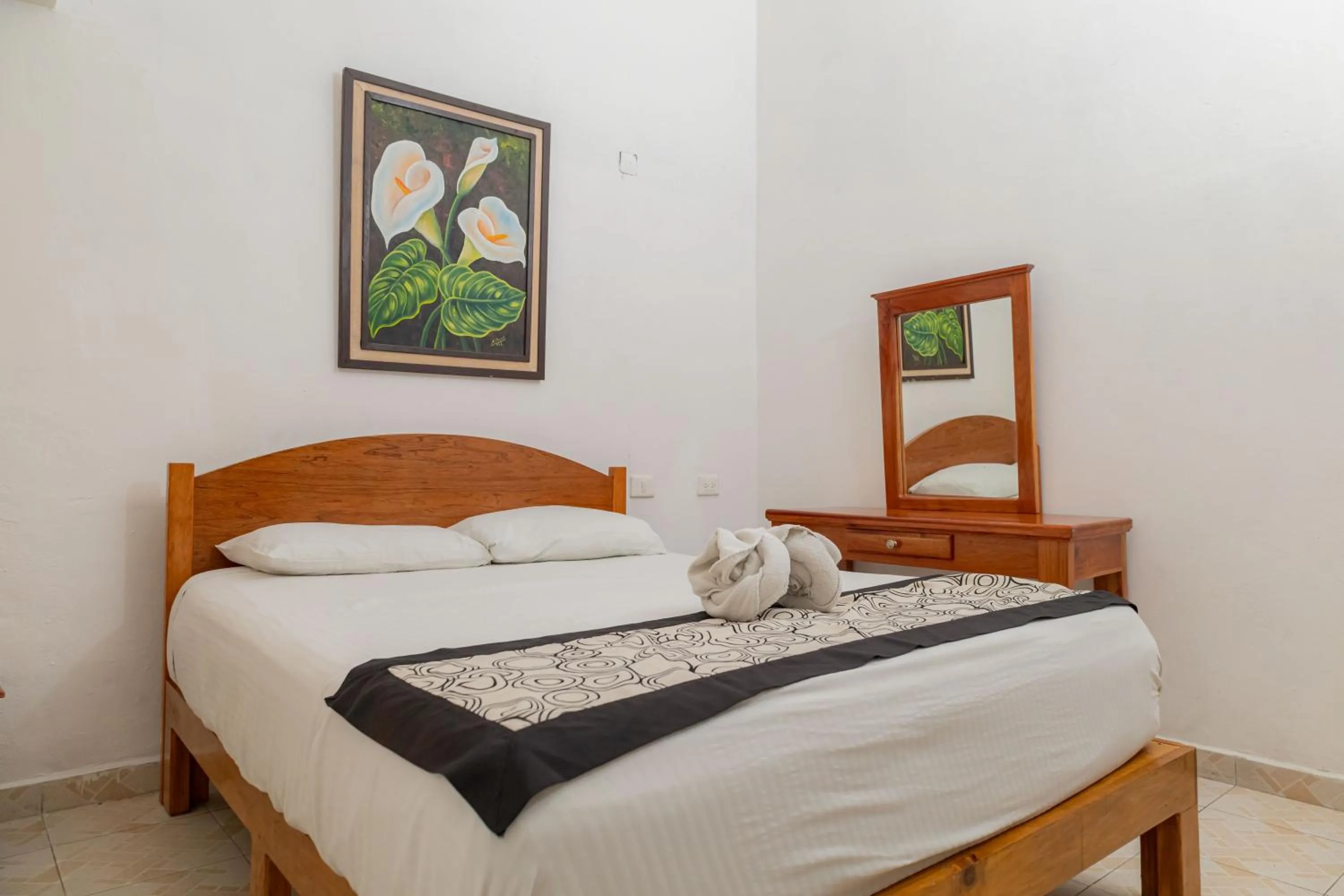 Bed in Hotel Las Palmas Cancun Centro