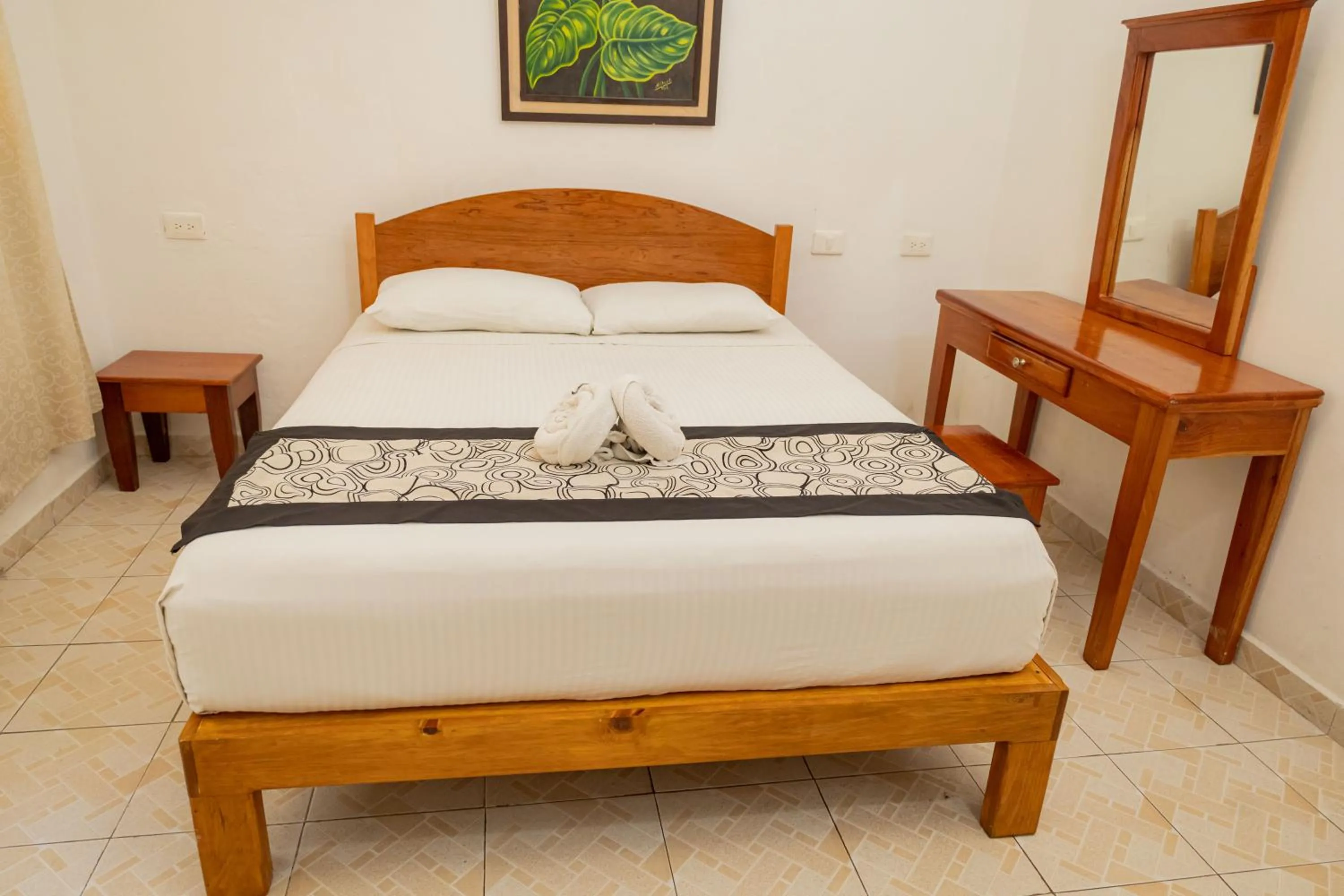 Bed in Hotel Las Palmas Cancun Centro