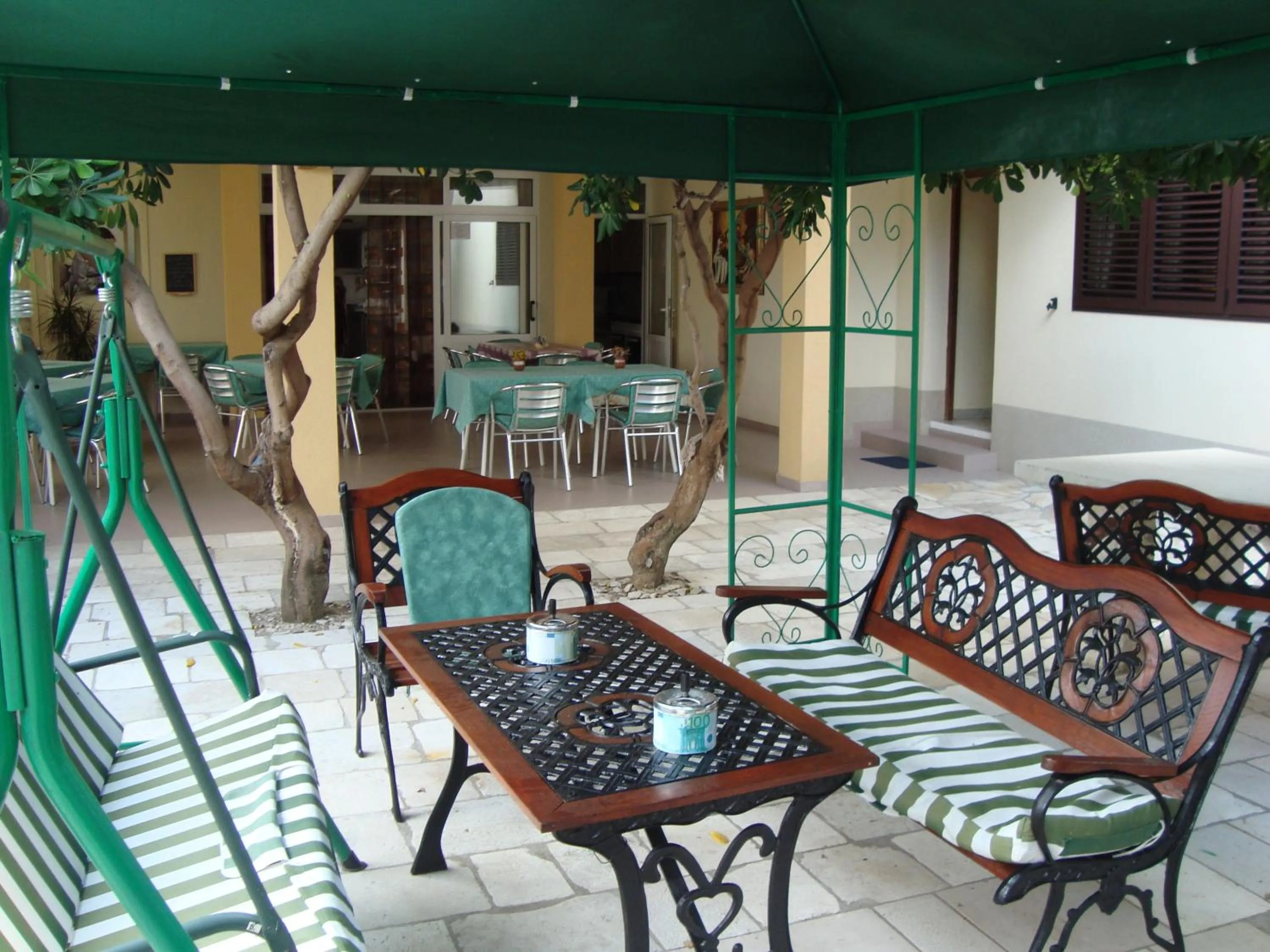 Communal lounge/ TV room in Rooms Villa Andreja