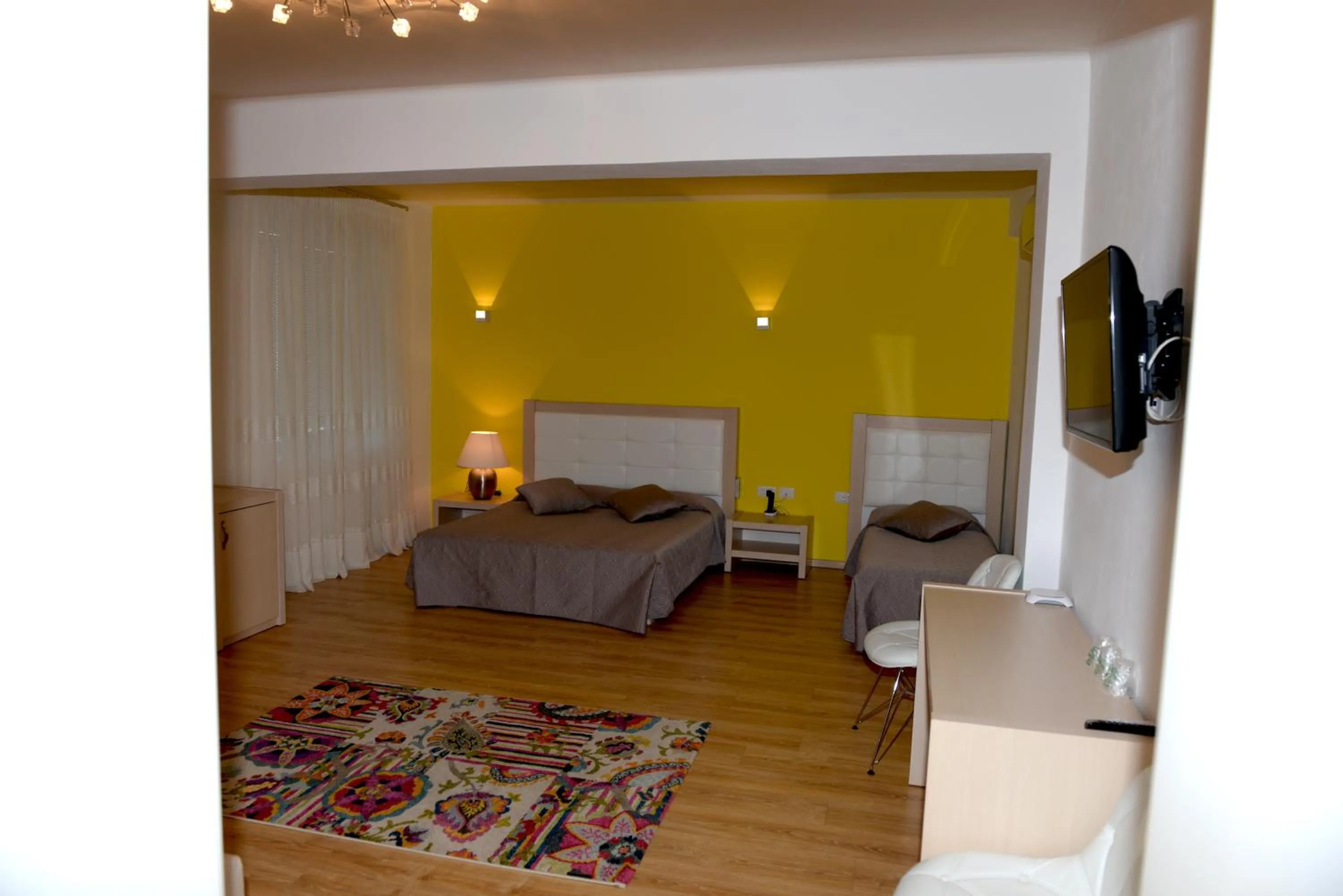 Decorative detail, Bed in Grand White City Hotel