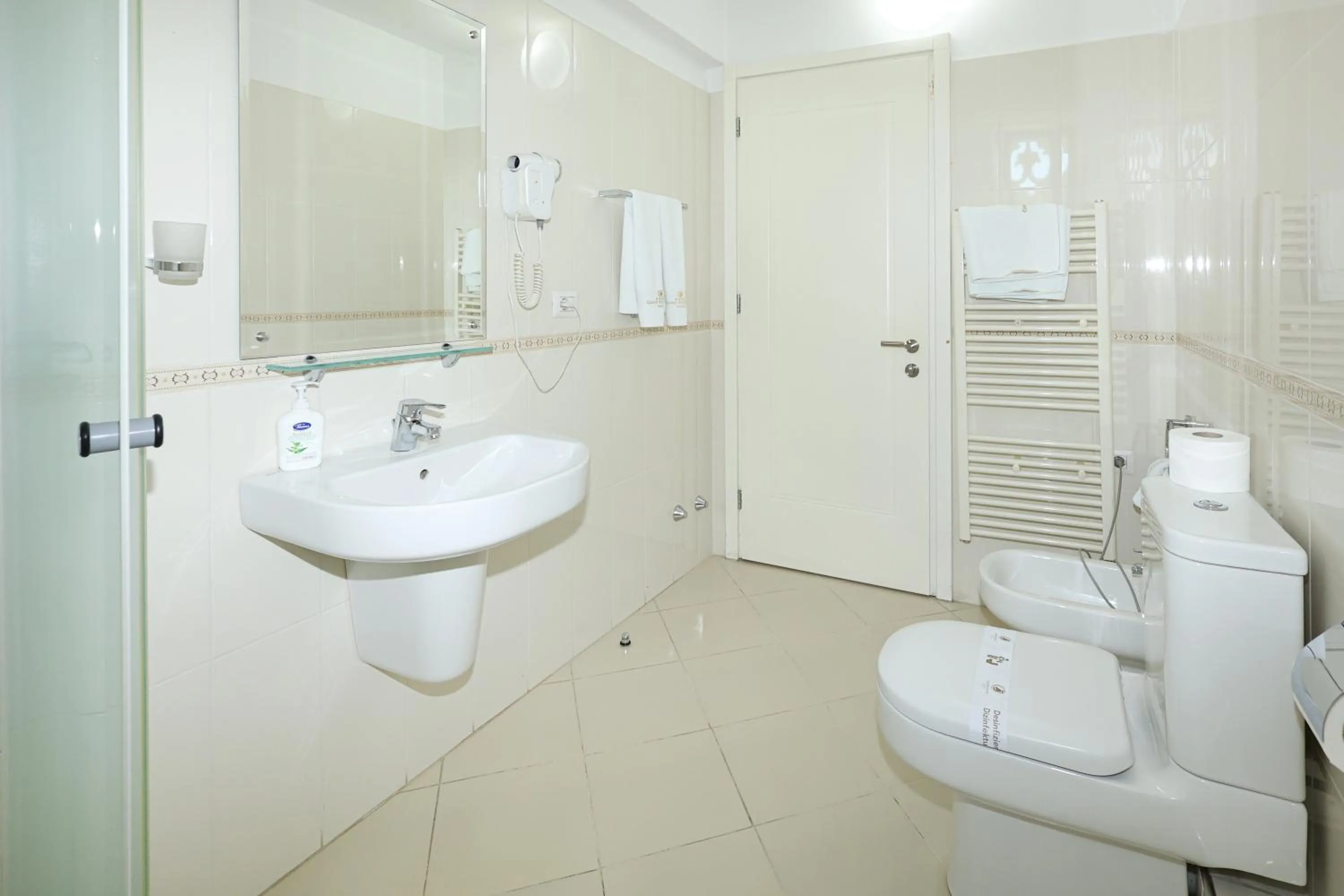 Bathroom in Grand White City Hotel