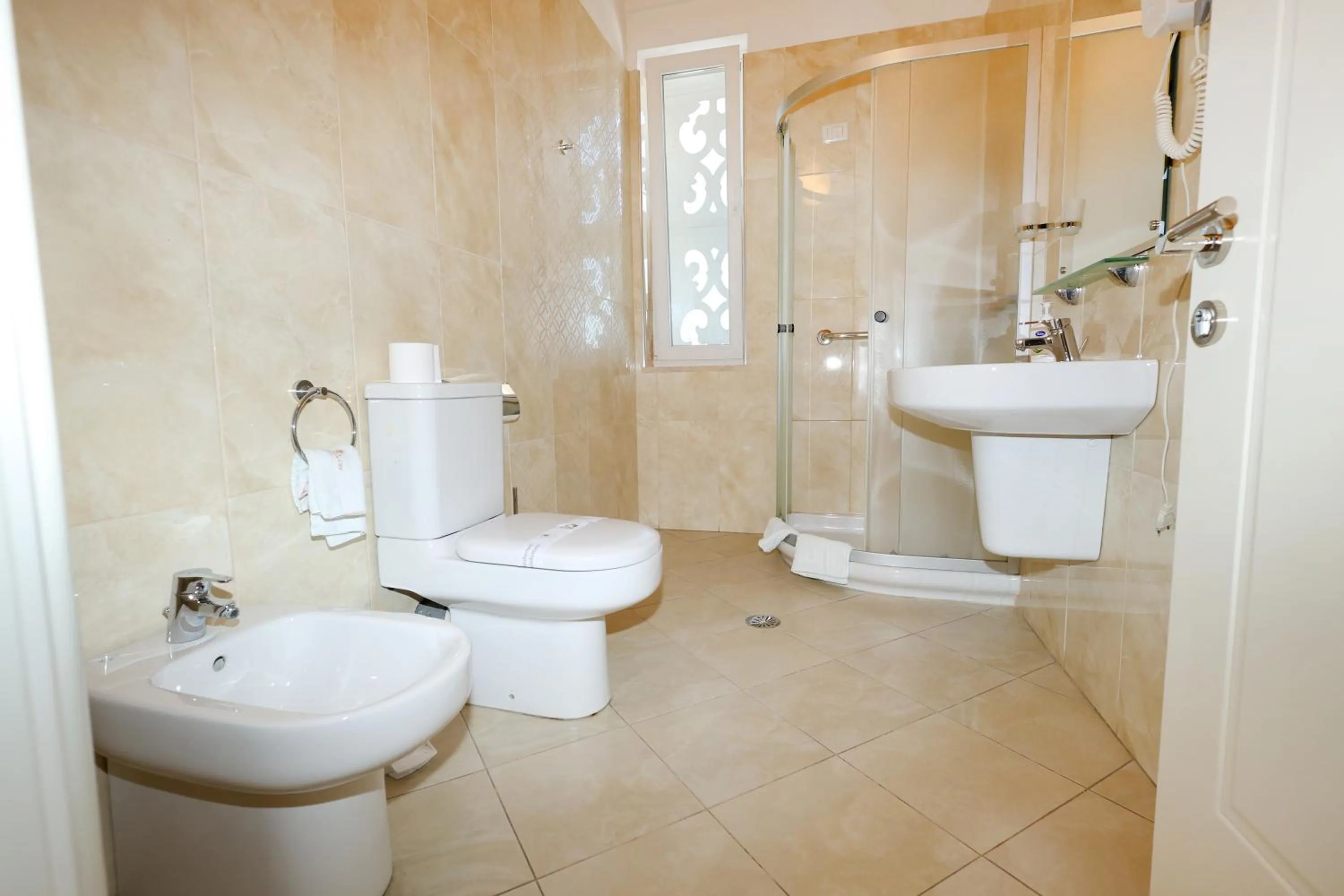 Bathroom in Grand White City Hotel