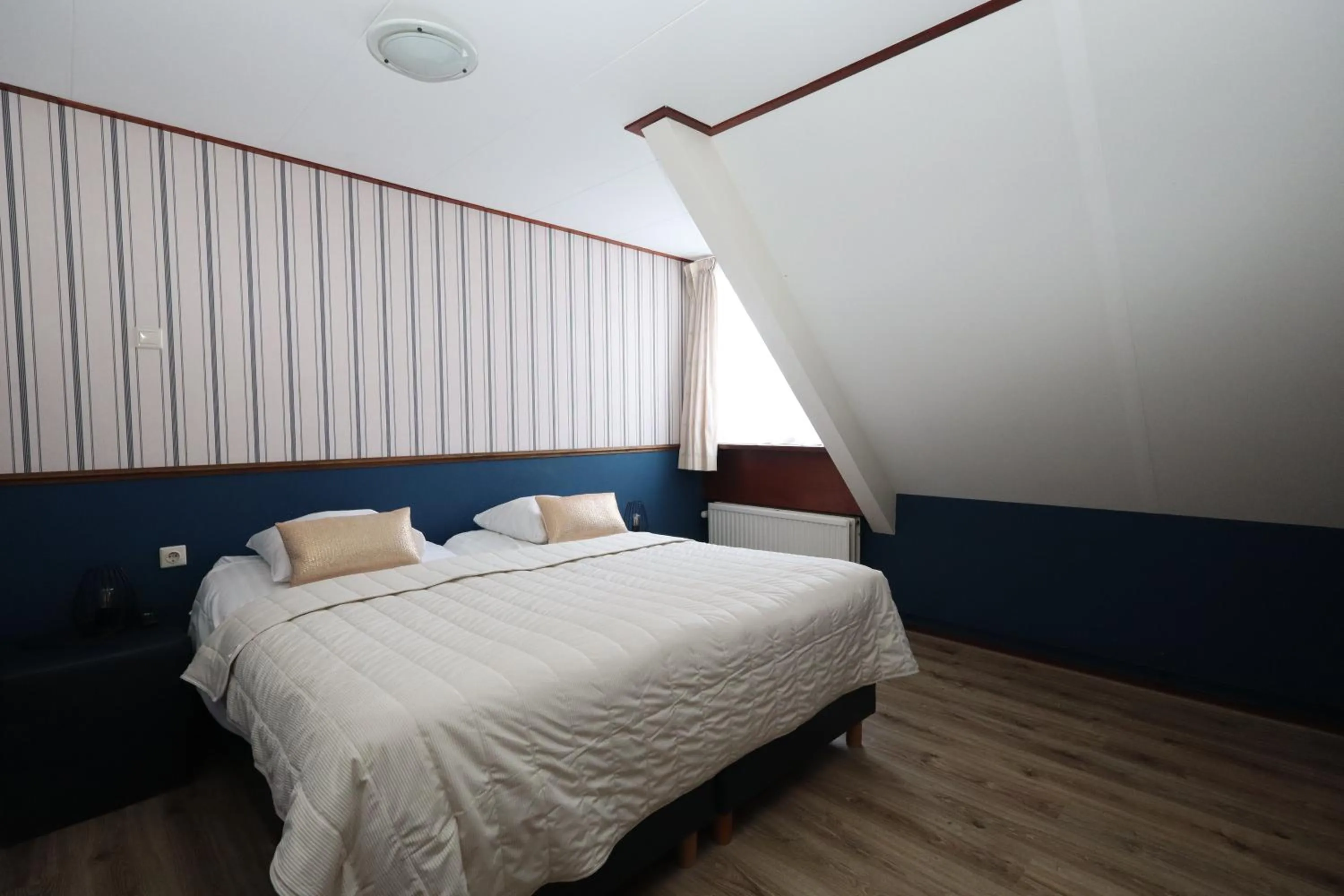 Bed in Hotel Restaurant de Boekanier