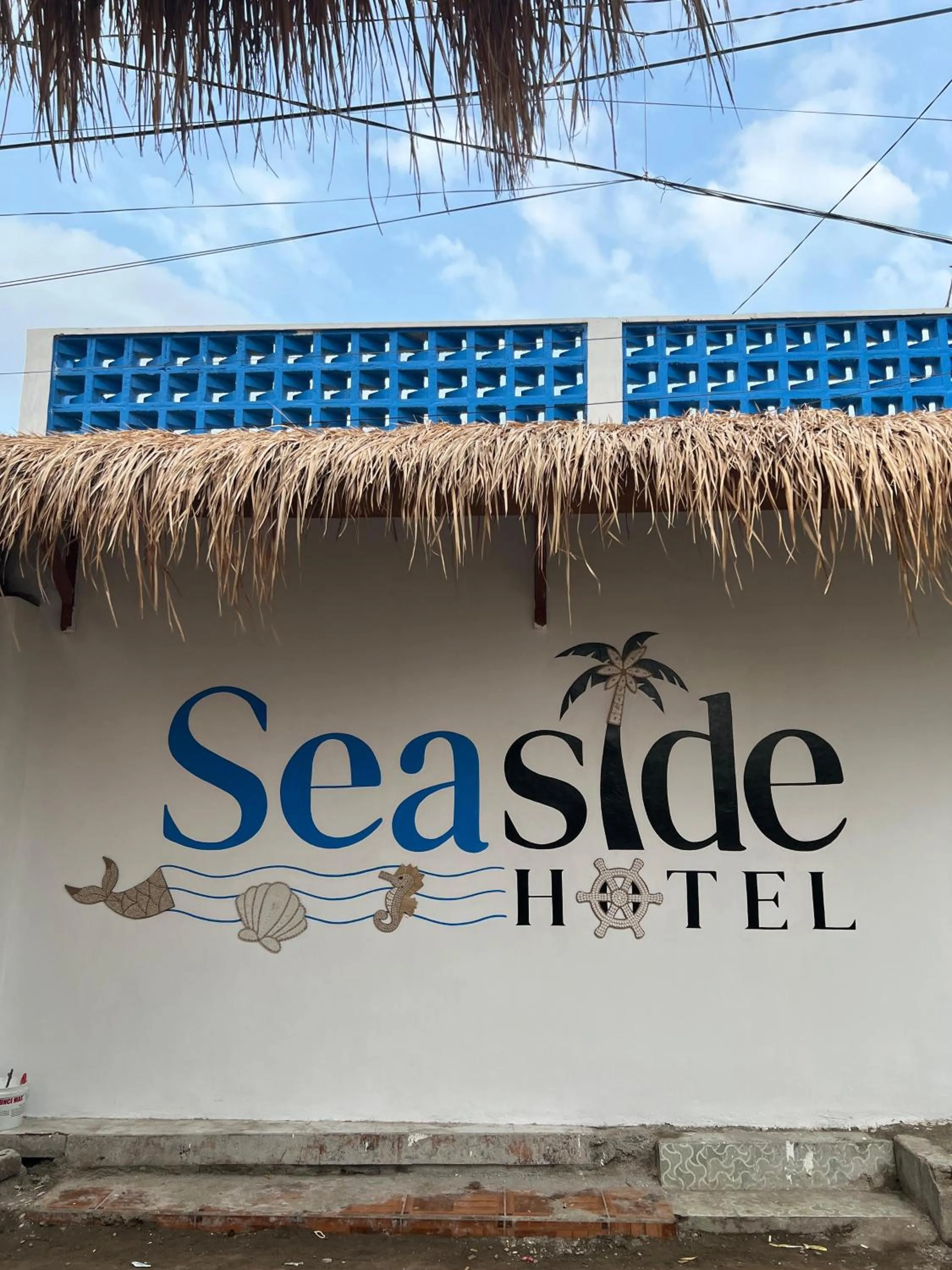 Property logo or sign in Seaside Hotel