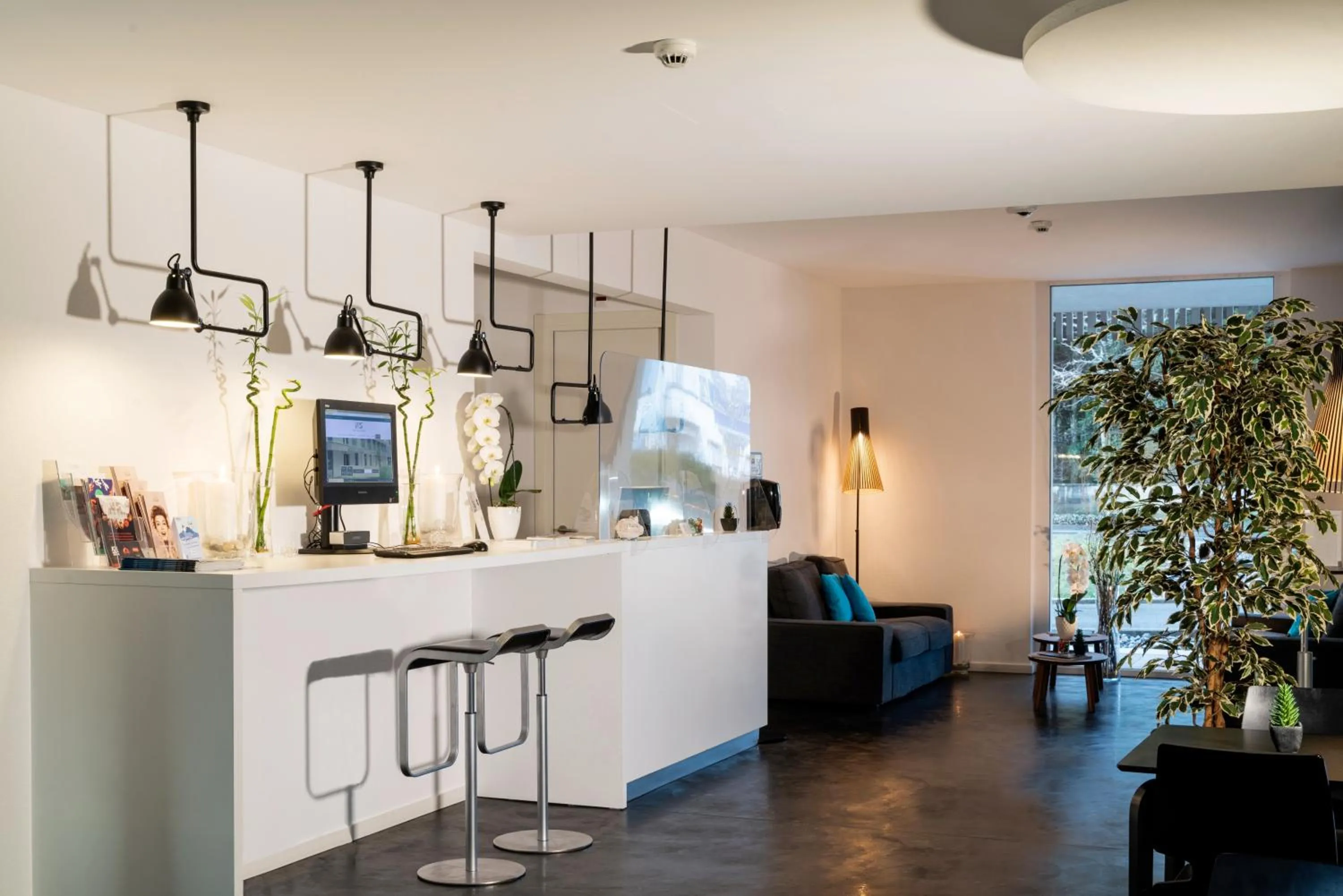 Lobby or reception in Hôtel de la Source Yverdon-les-Bains