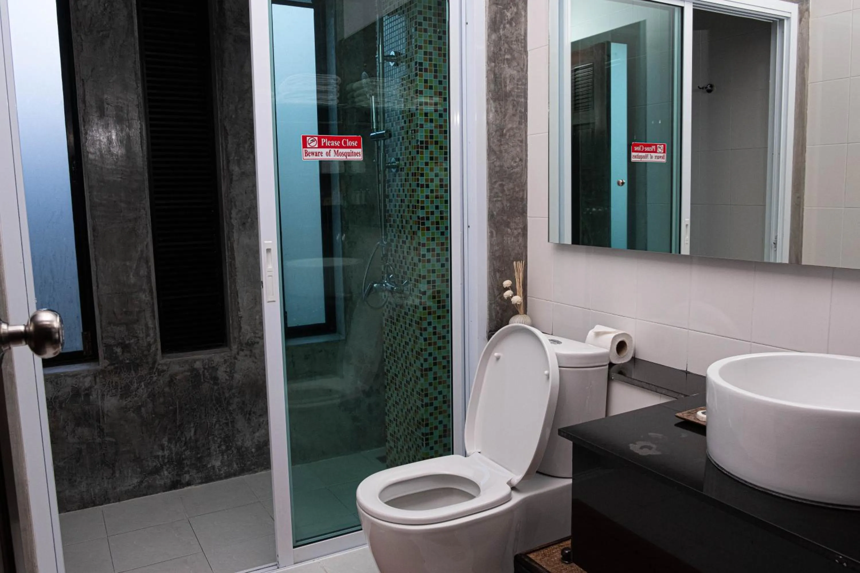 Toilet in Victoria Cliff Hotel & Resort, Kawthaung