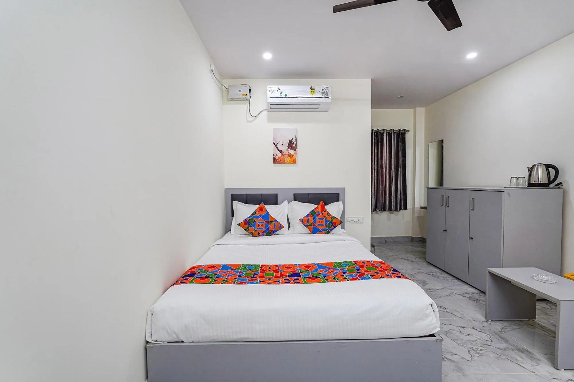 Bed in FabHotel Ivory Pearl - Nr Sony Signal