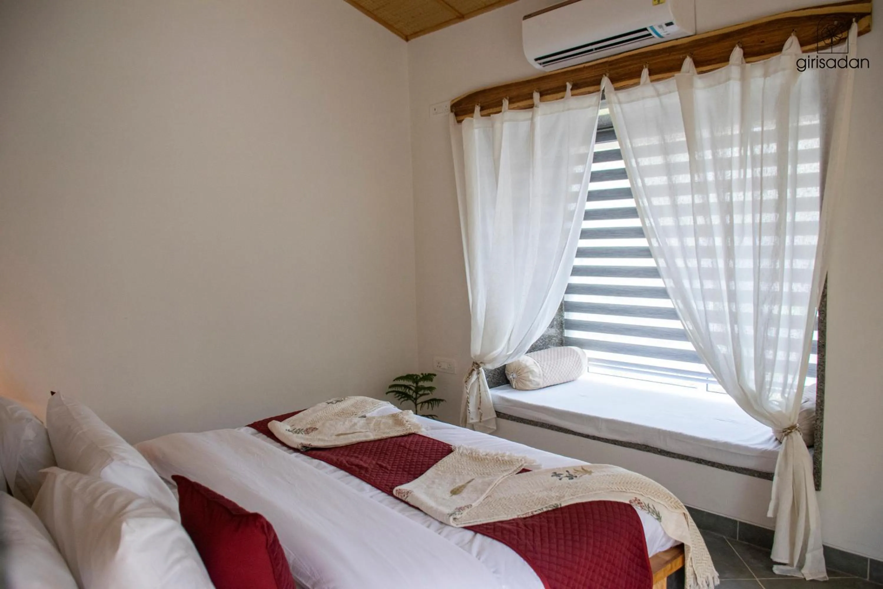 Bed in GiriSadan Organic Retreat & Experiences