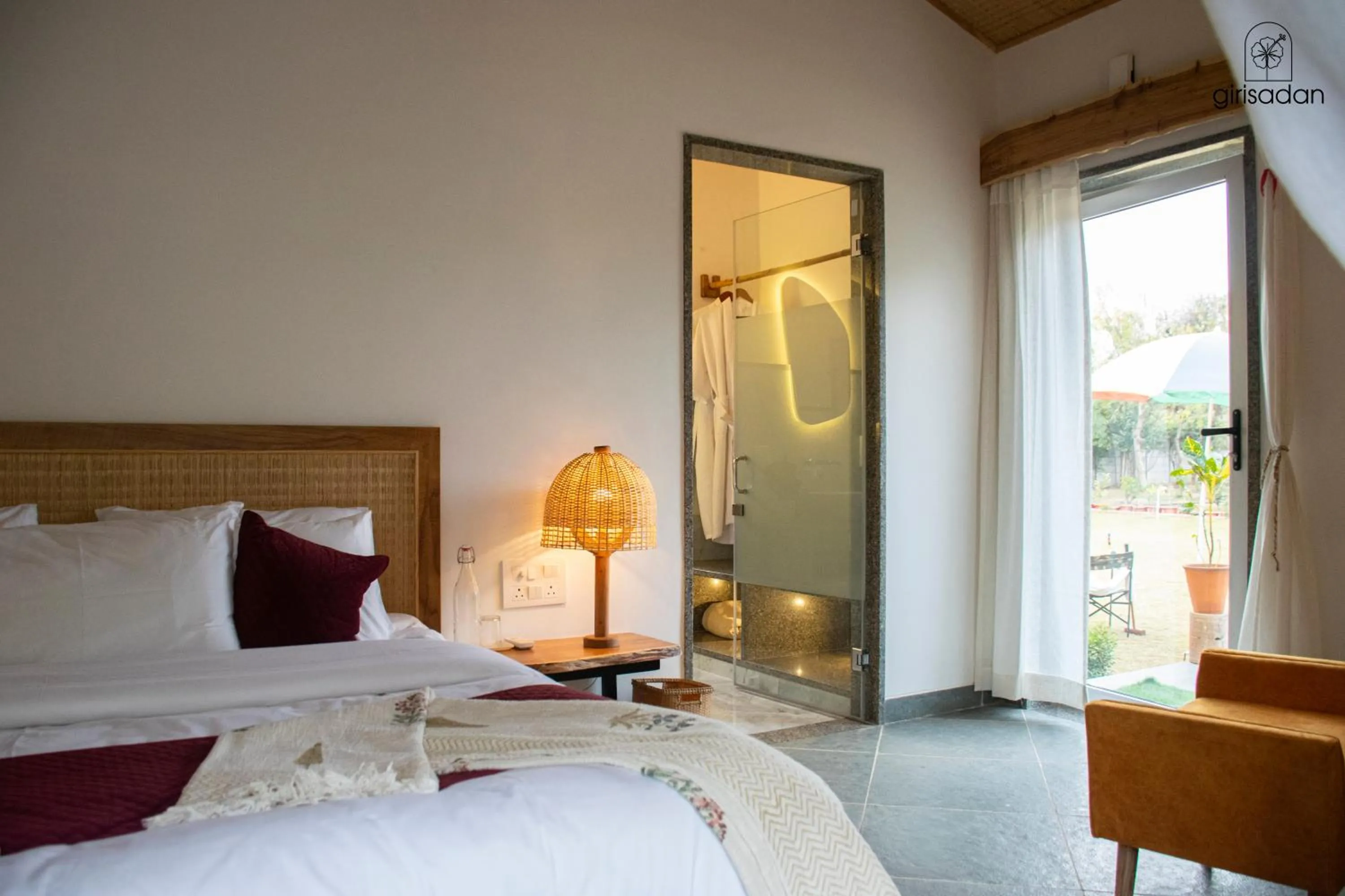 Bed in GiriSadan Organic Retreat & Experiences