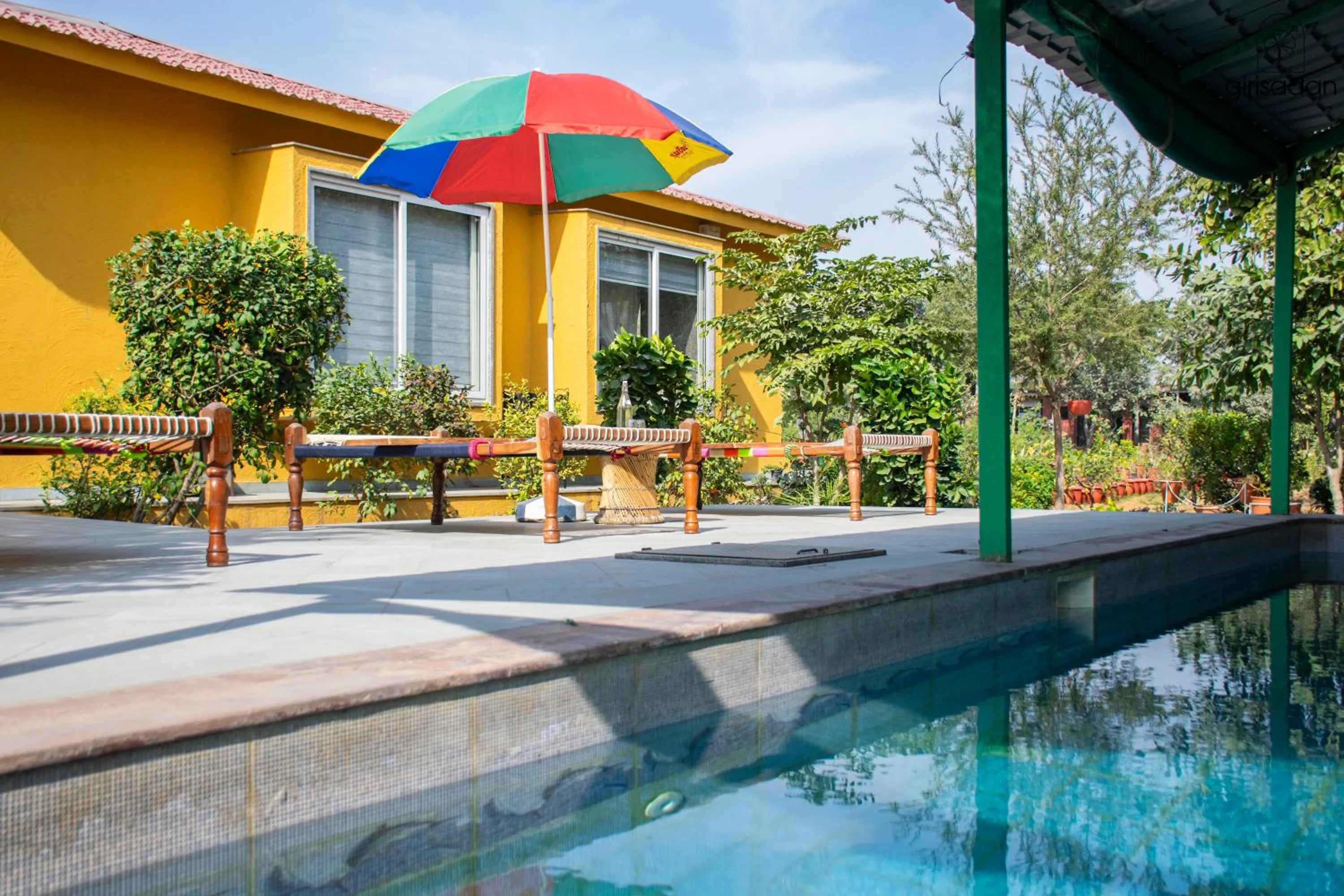 Swimming pool in GiriSadan Organic Retreat & Experiences