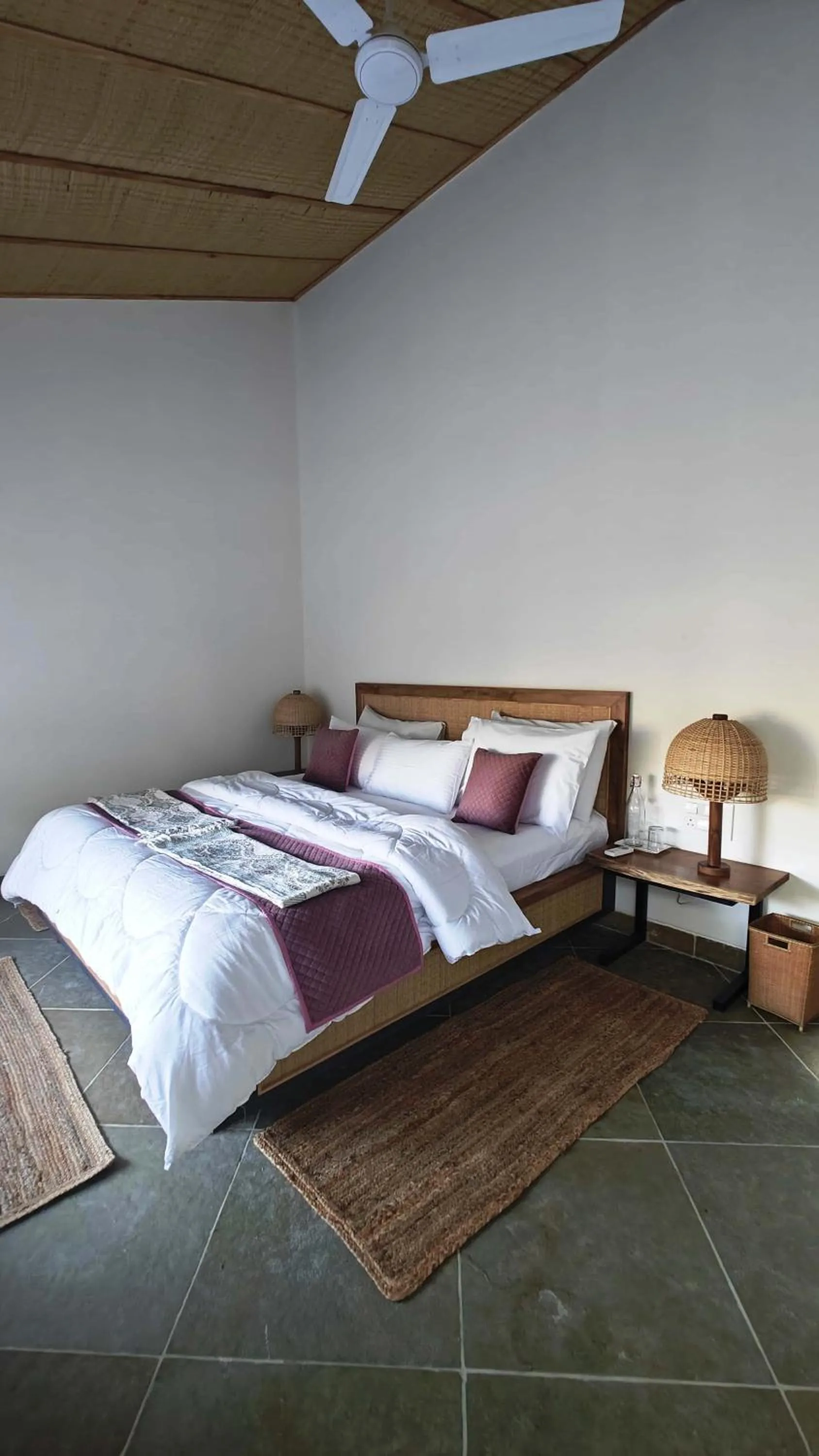Bed in GiriSadan Organic Retreat & Experiences