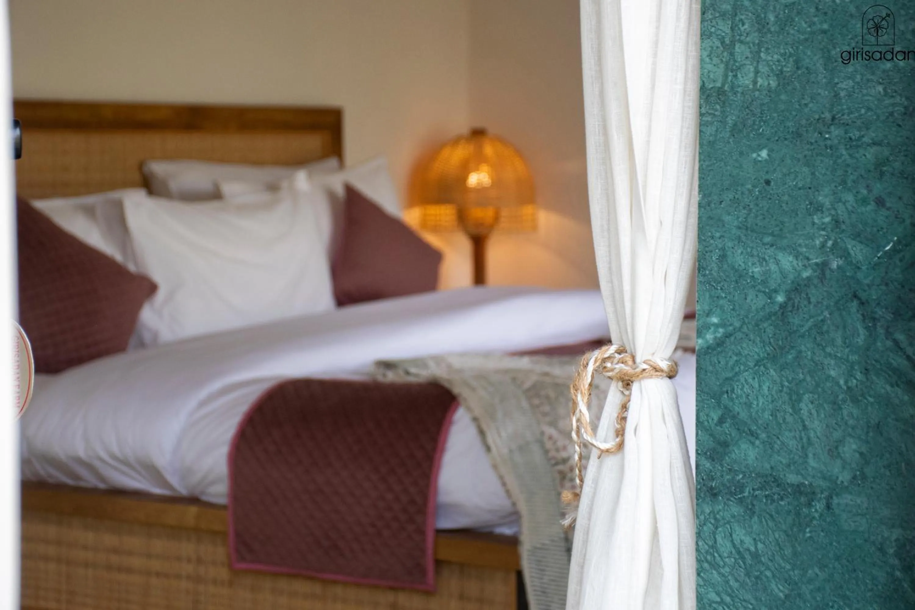 Bed in GiriSadan Organic Retreat & Experiences