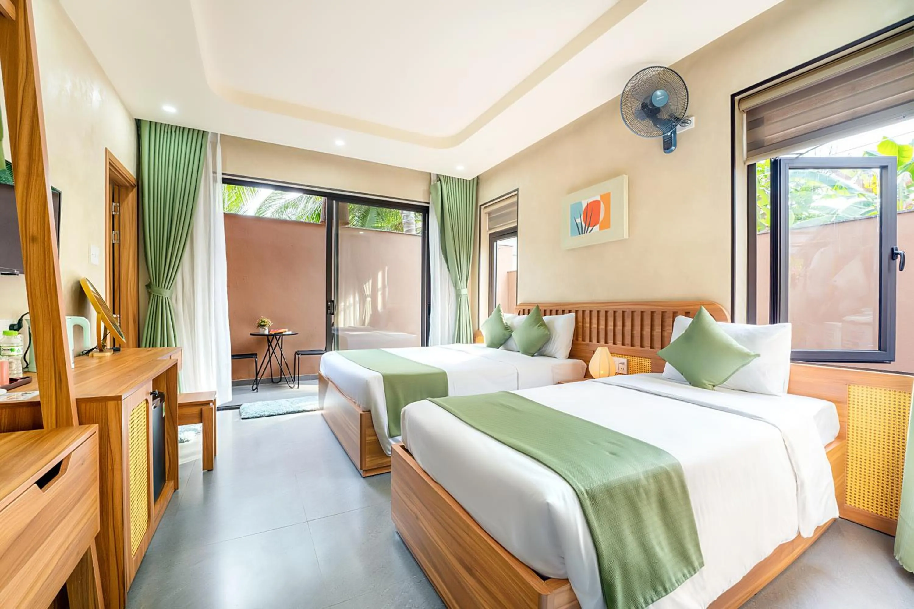 Bed in The Linh Seaside Villa Hoi An