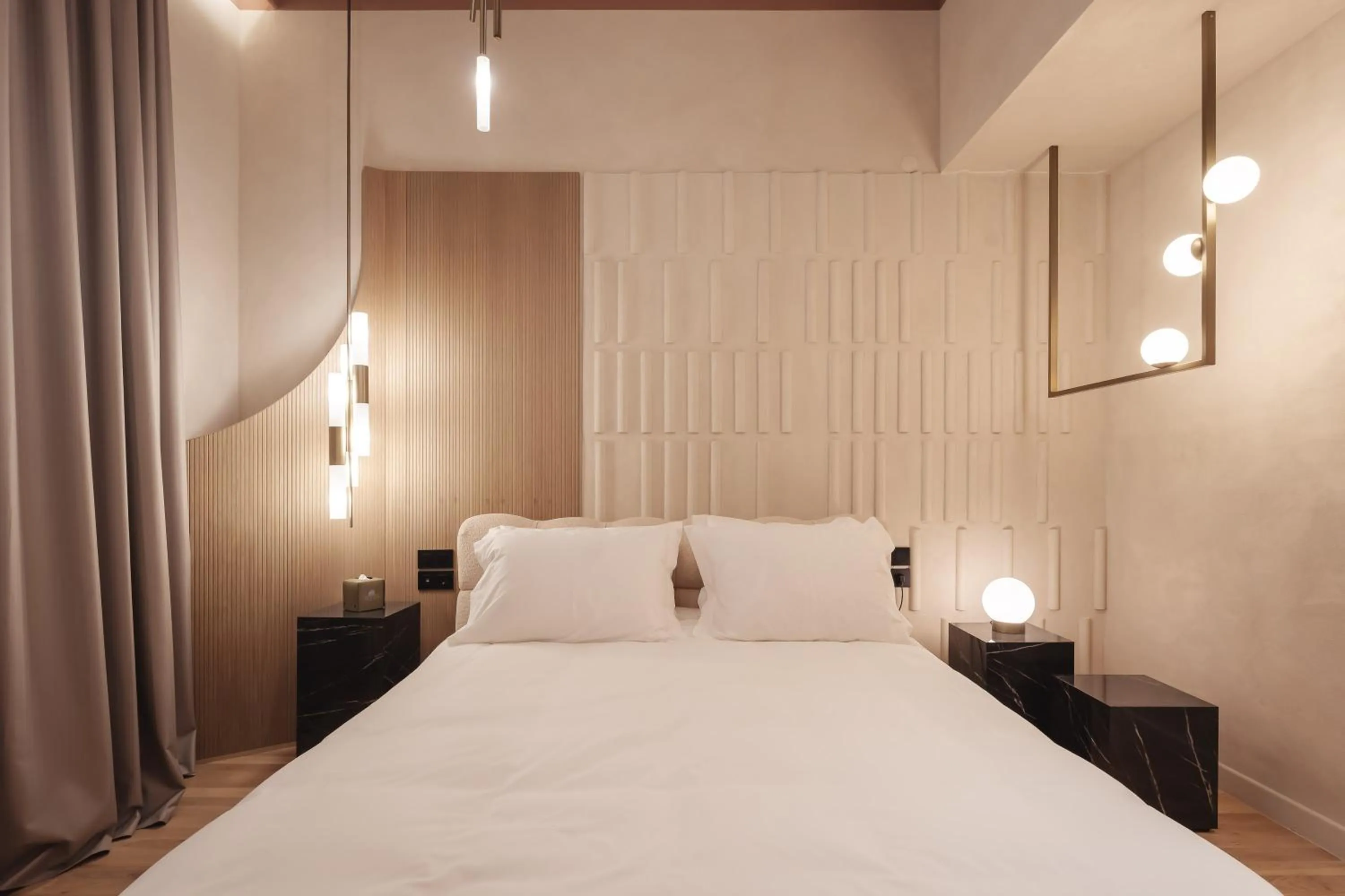 Bed in Zenith Premium Suites