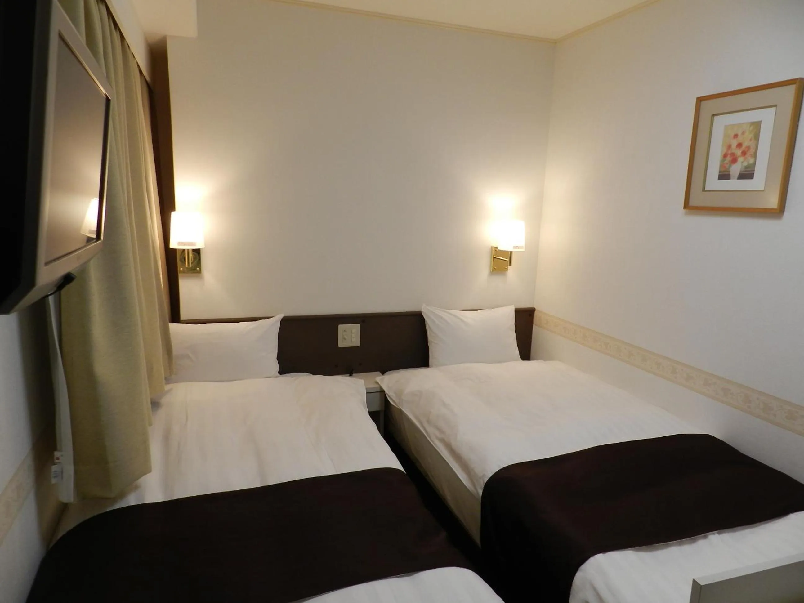 Bed in Check In Matsuyama