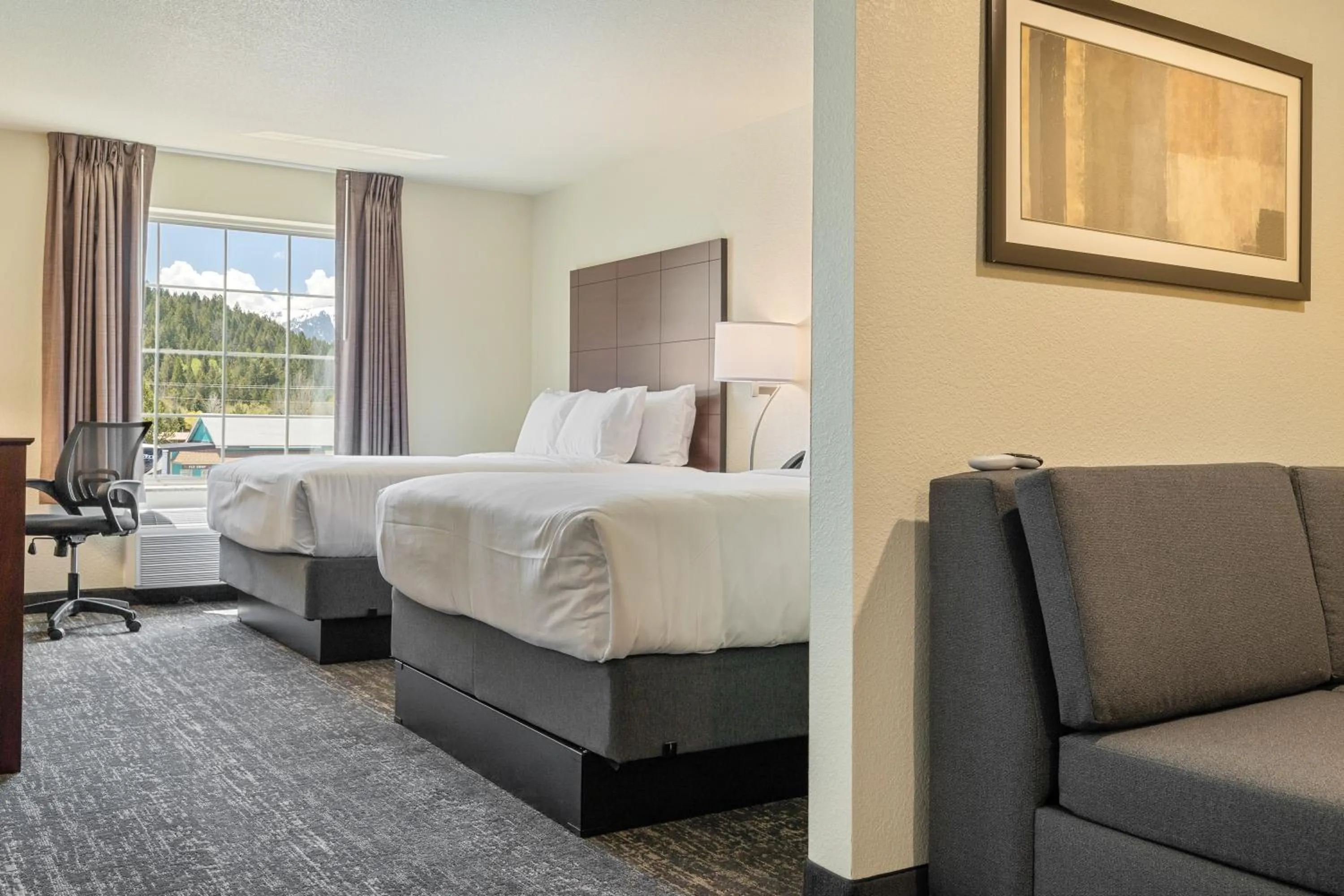 Bed in Cobblestone Hotel & Suites - Alpine