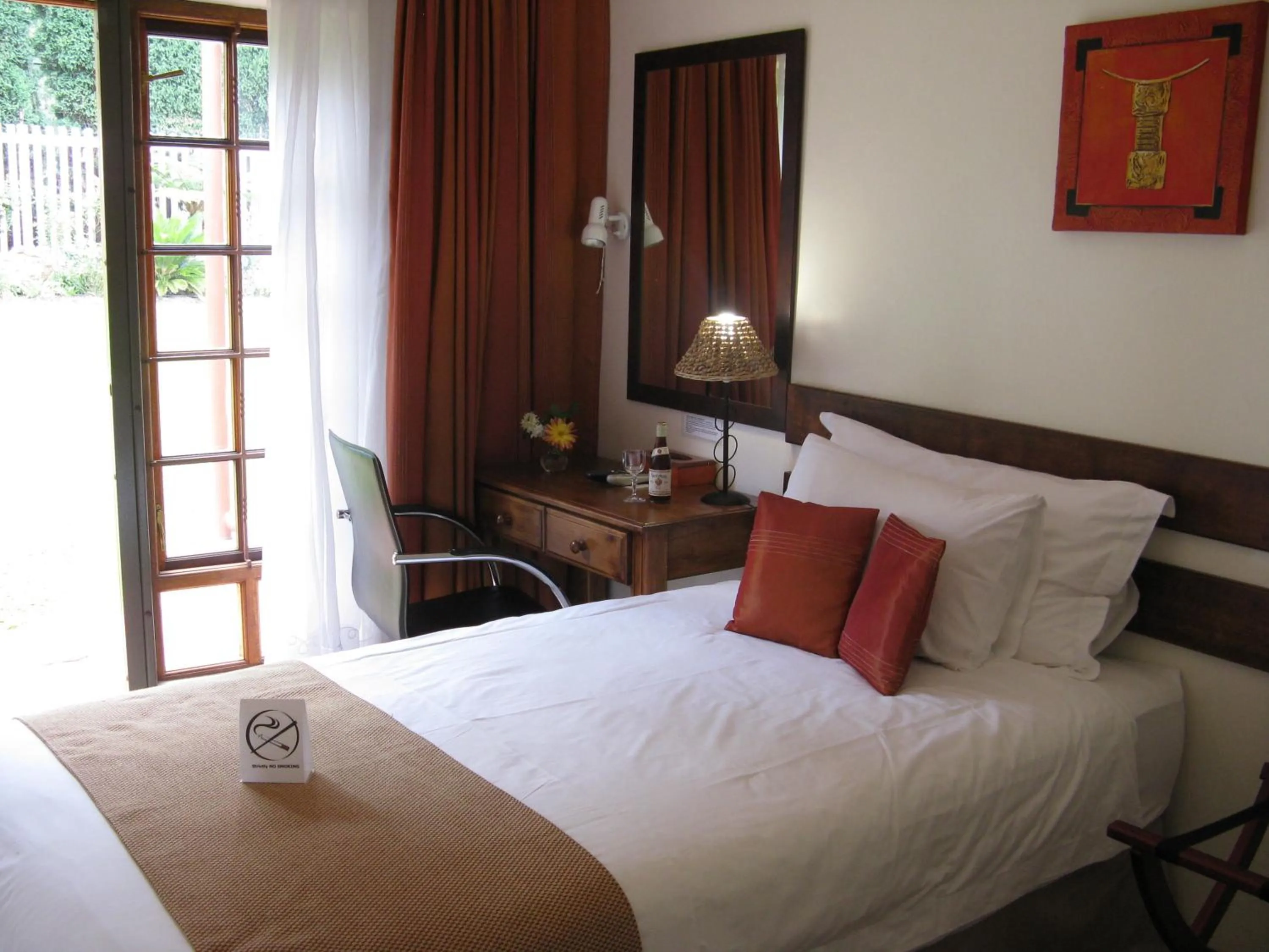 Bedroom in Touraco Guesthouse
