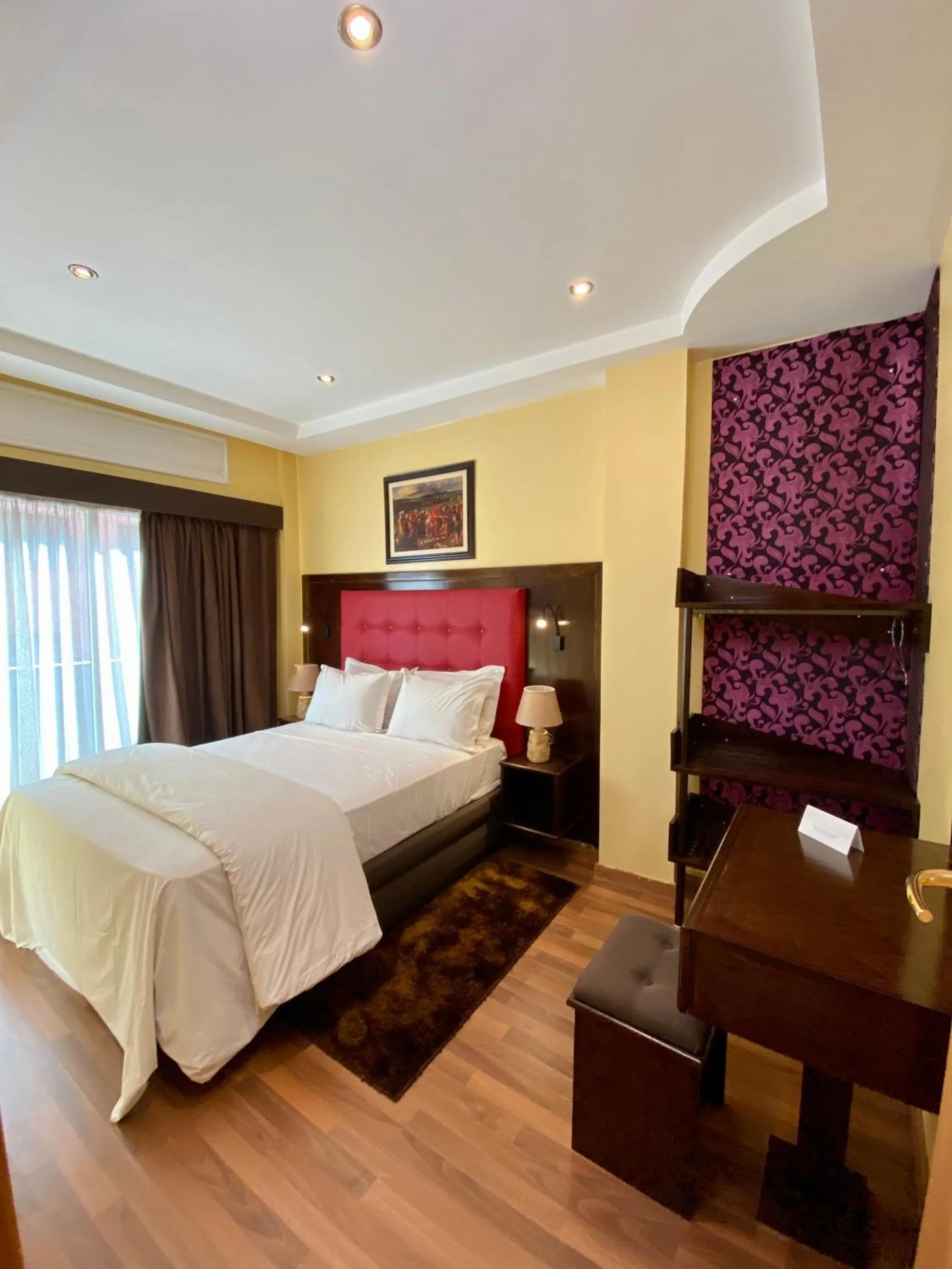 Bed in Appart Hôtel Oleandro