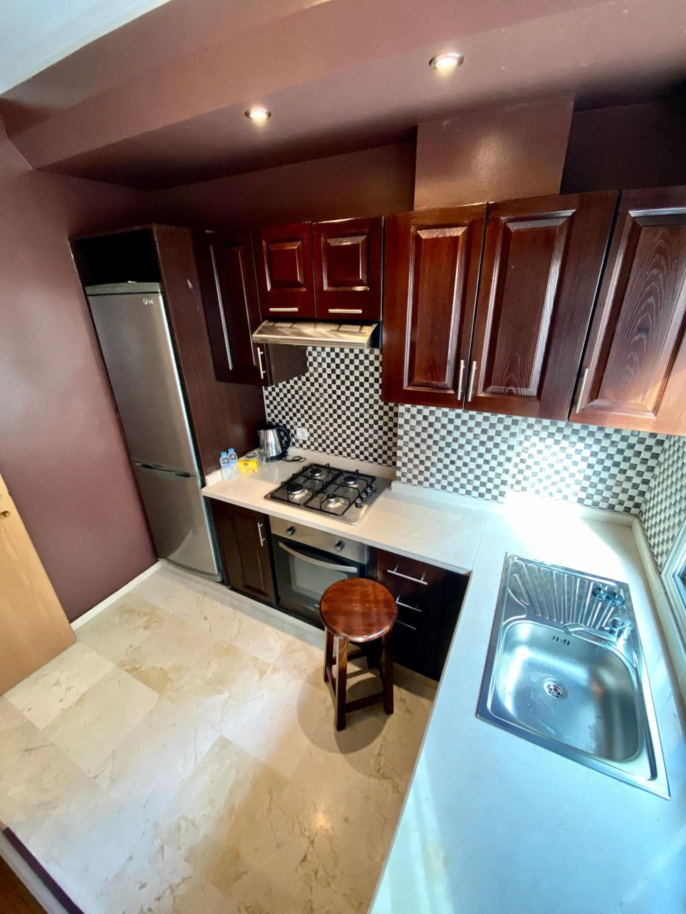 Kitchen or kitchenette in Appart Hôtel Oleandro