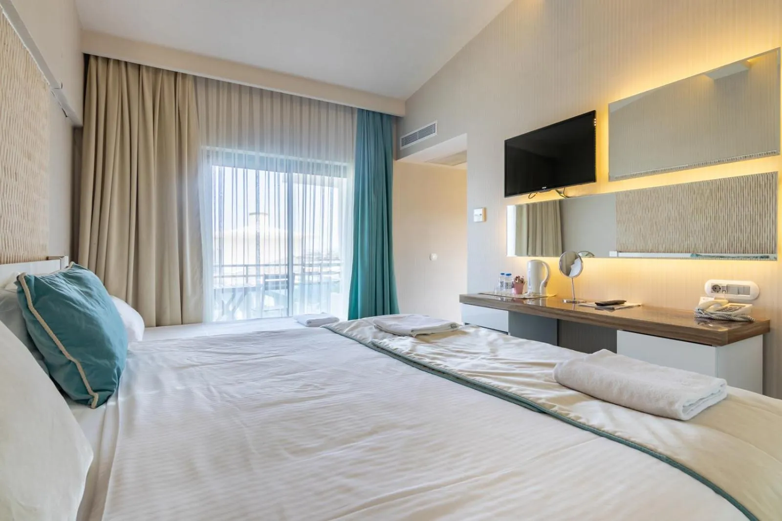 Bed in The D Hotel Çeşme Resort