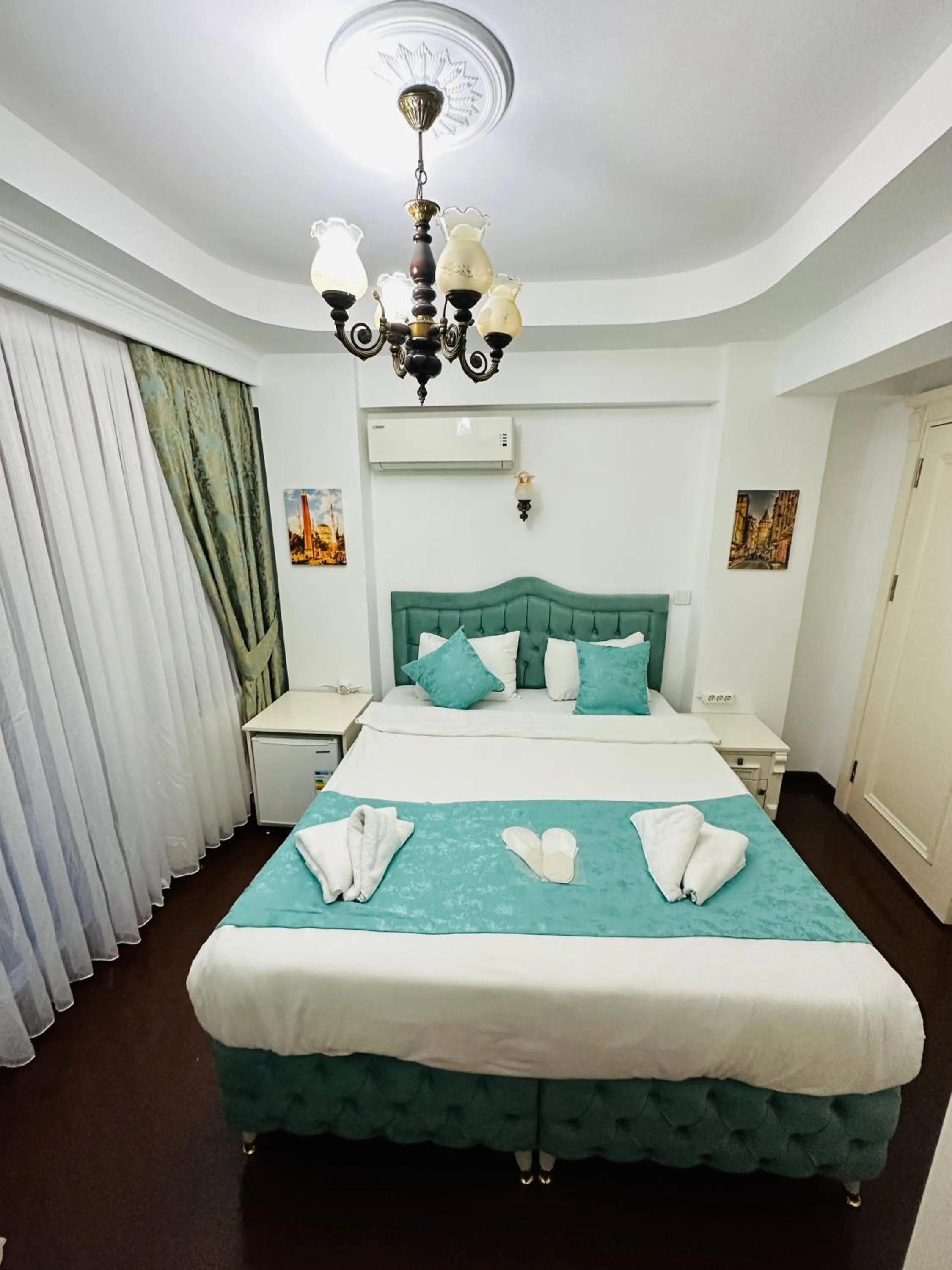 Bed in La Petite Maison Hotel