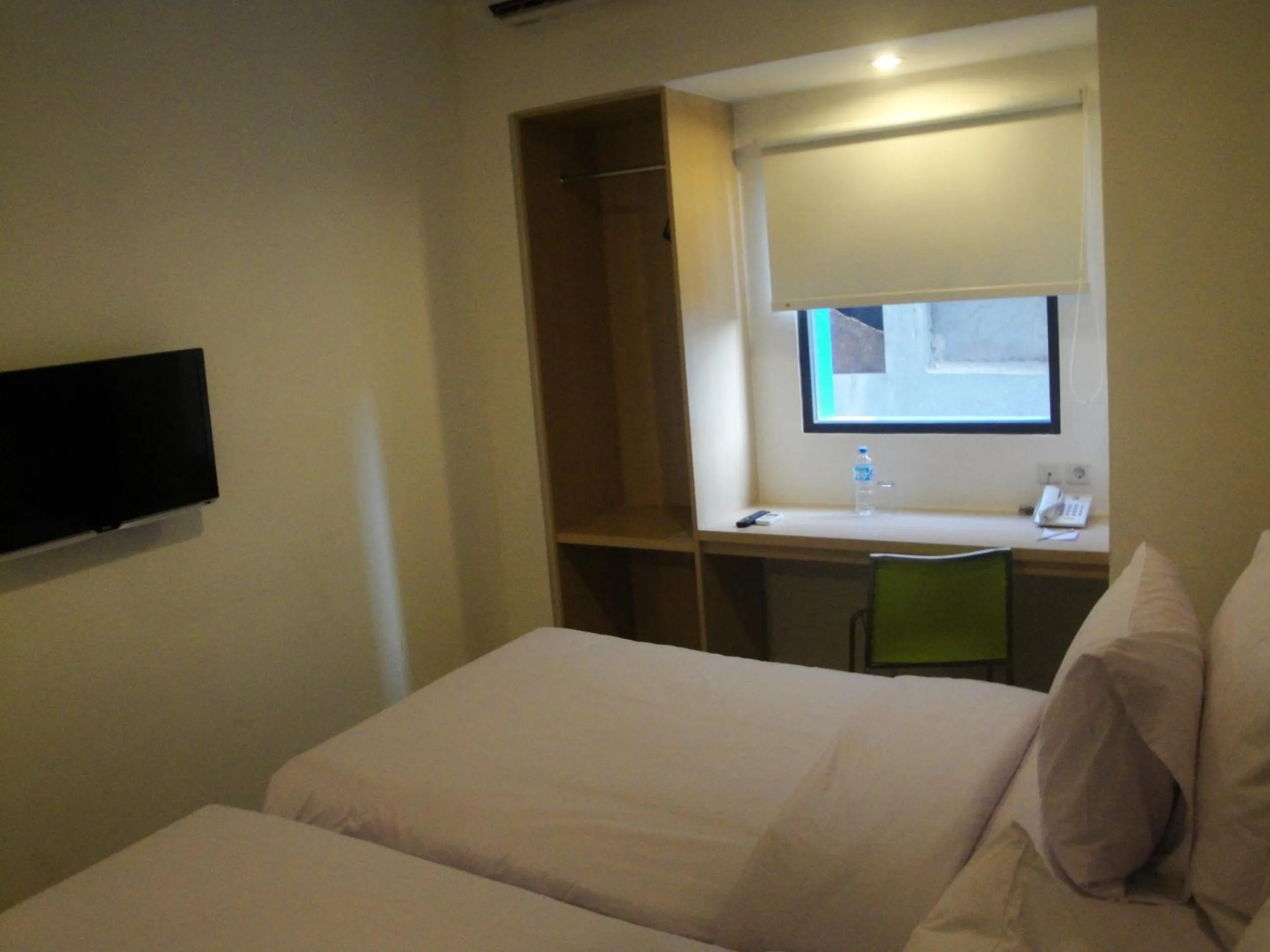 Bed in Top Hotel Manado by Gran Puri