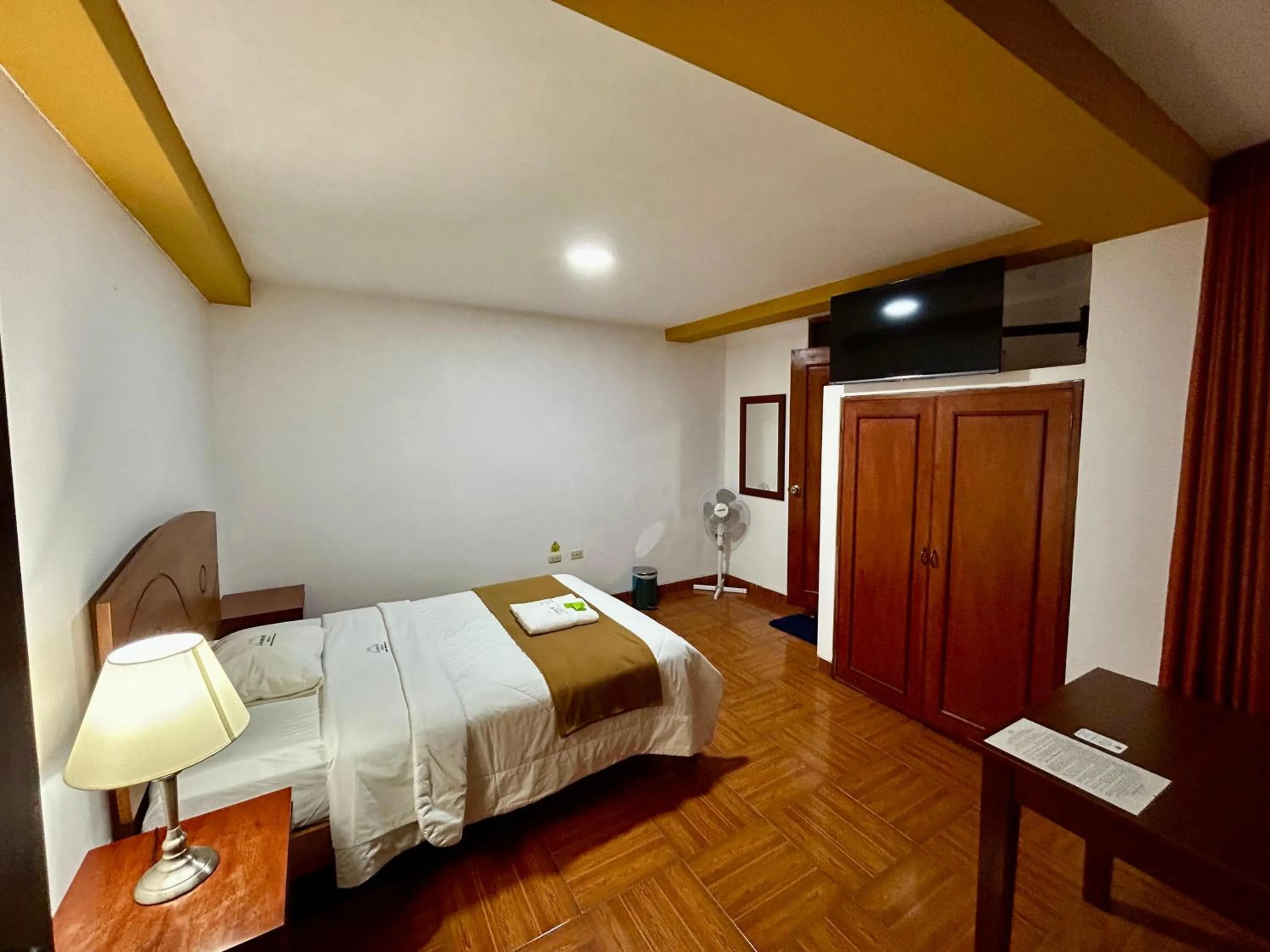 Bed in HOTEL LOS ANDES SUITE