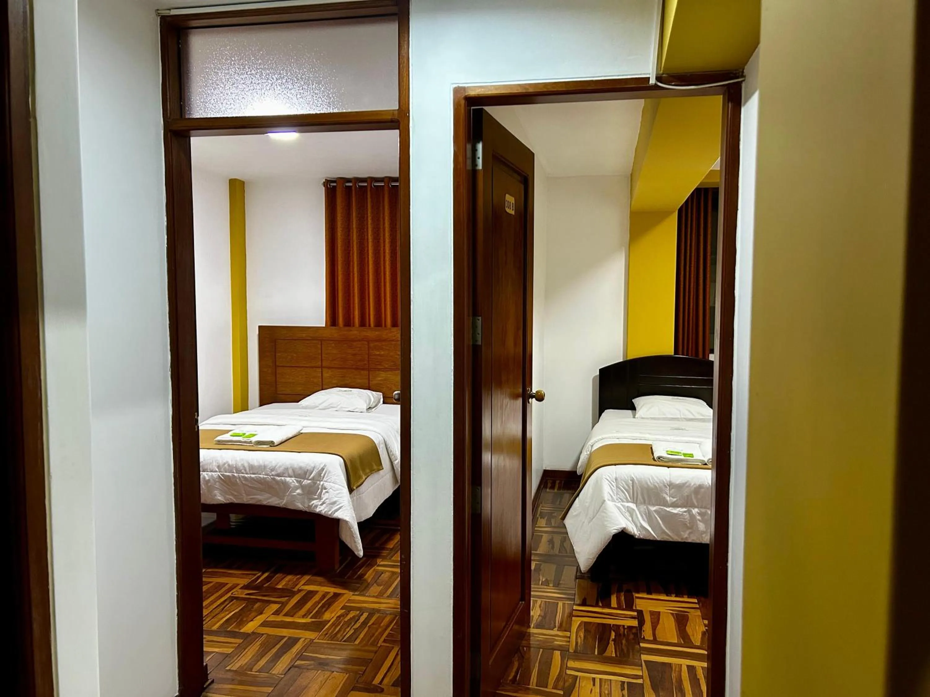 Bed in HOTEL LOS ANDES SUITE