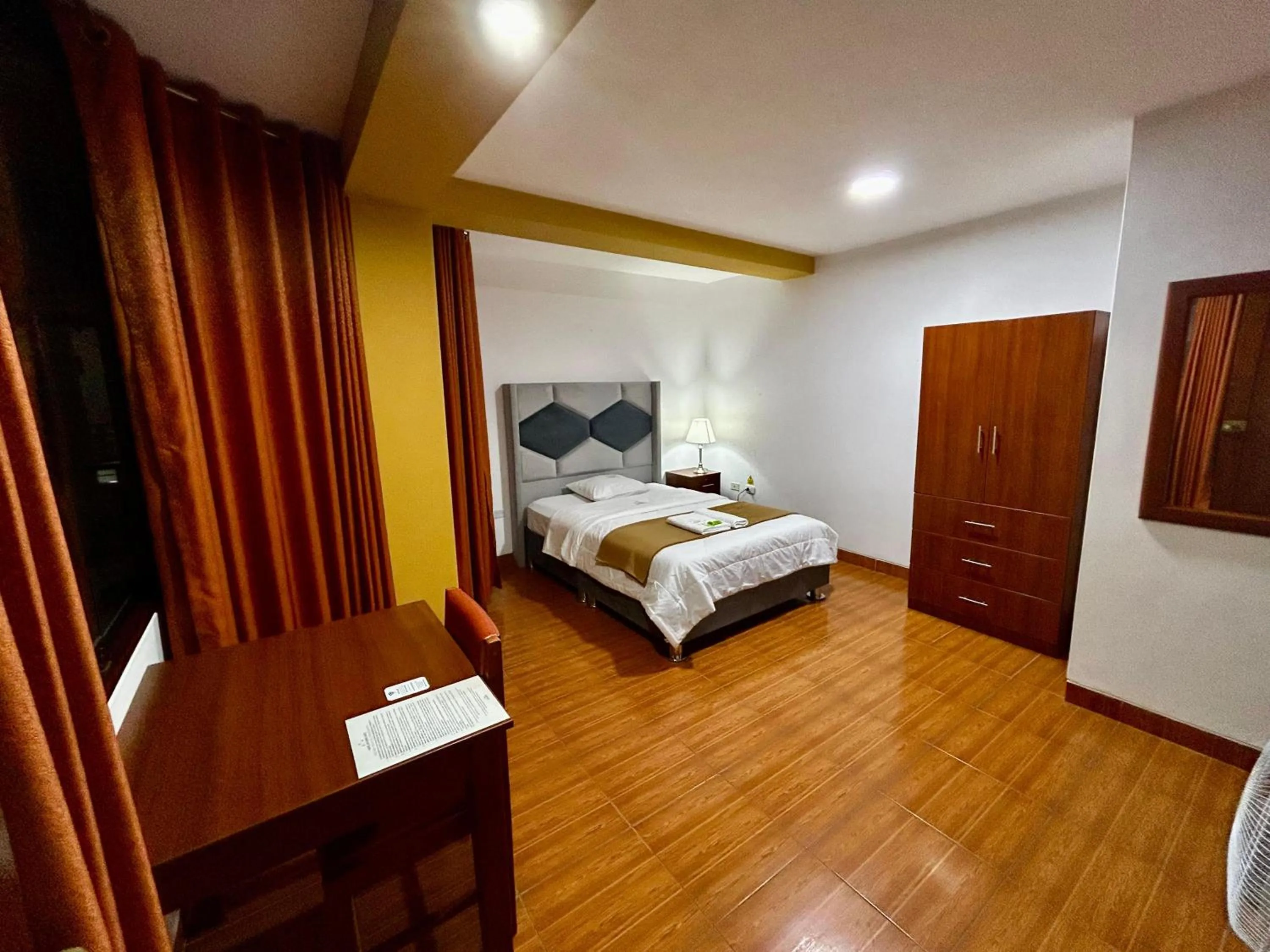 Bed in HOTEL LOS ANDES SUITE