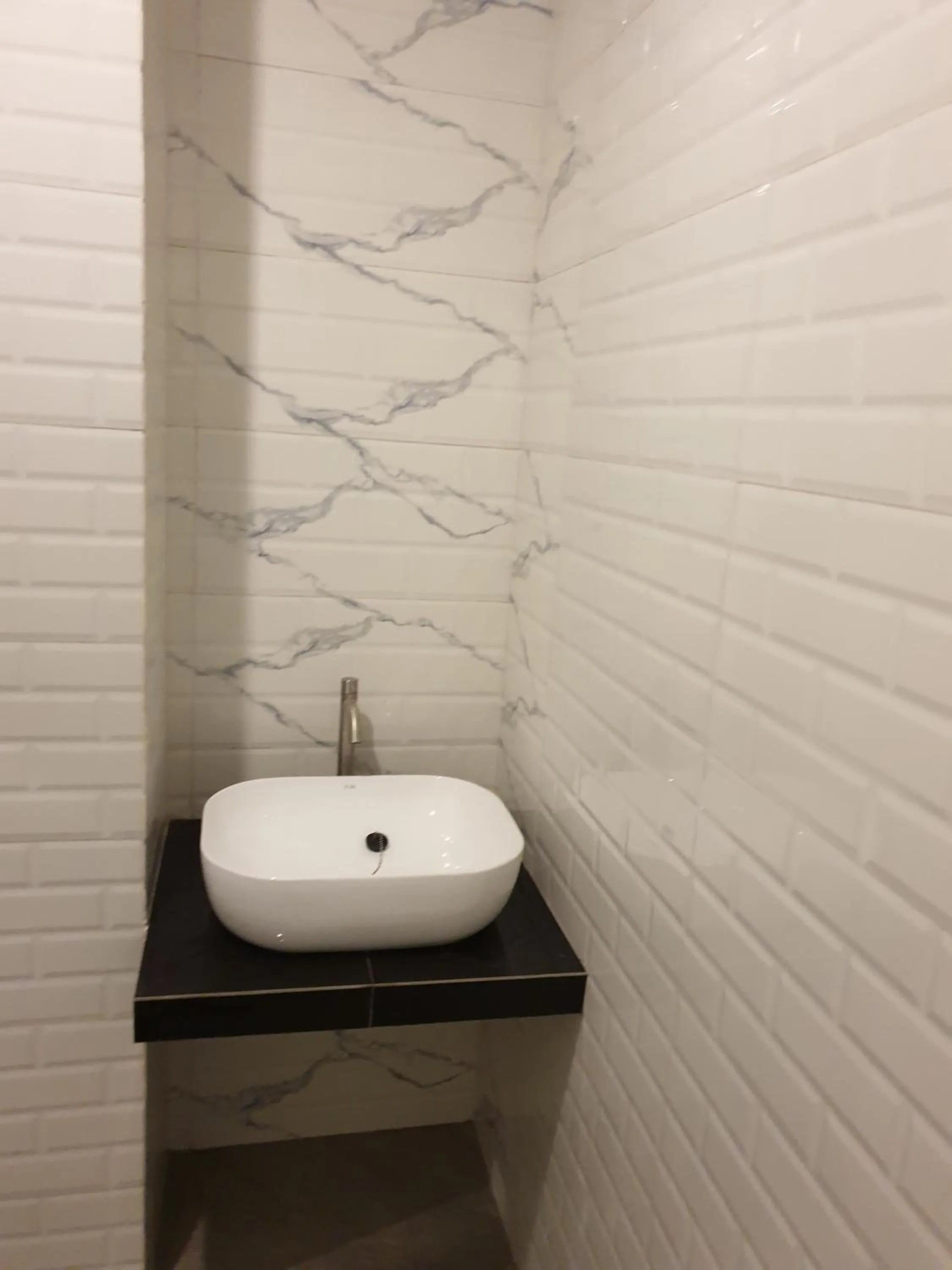 Bathroom in Cozy centre Simpang Lima Semarang