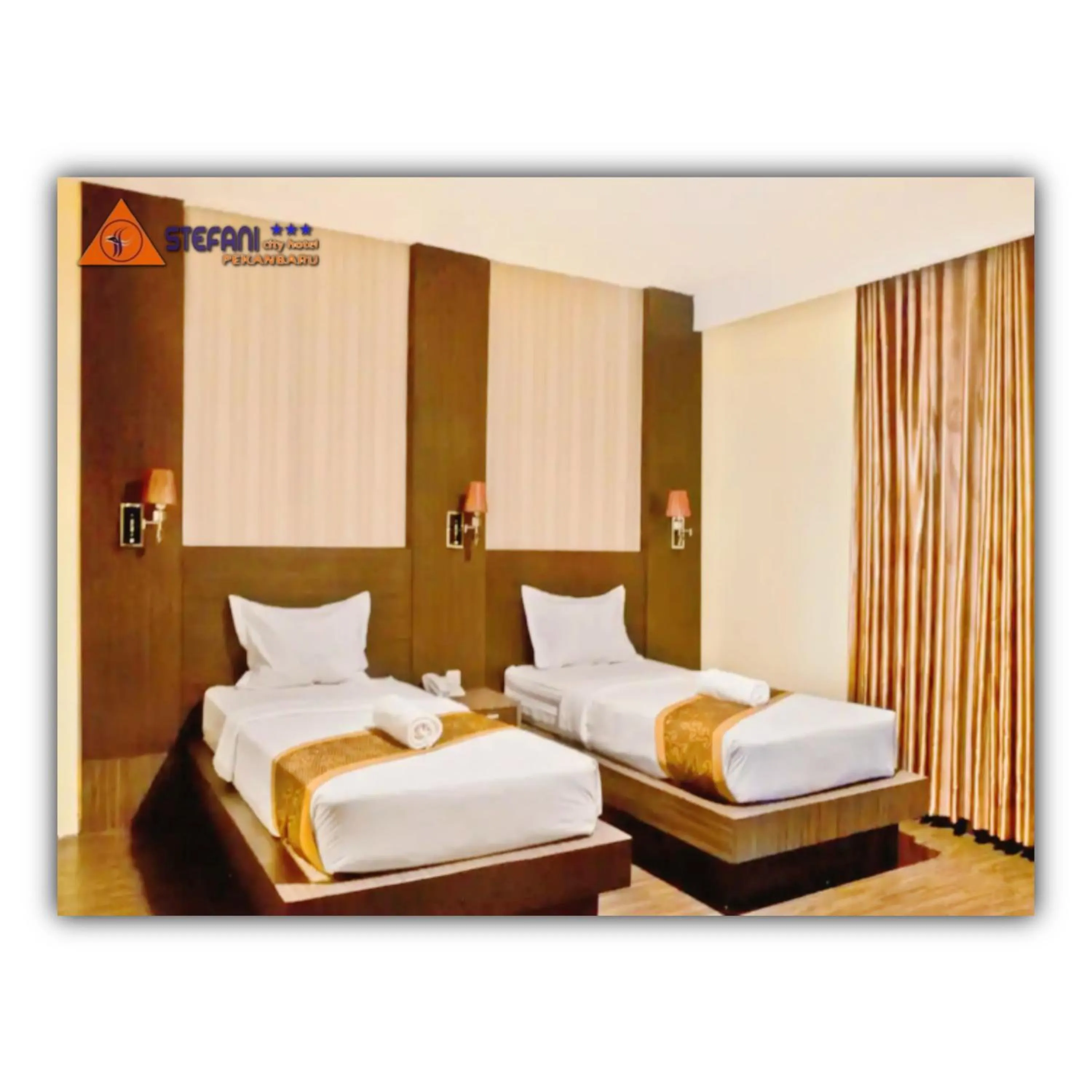 Bed in STEFANI MAKATI HOTEL