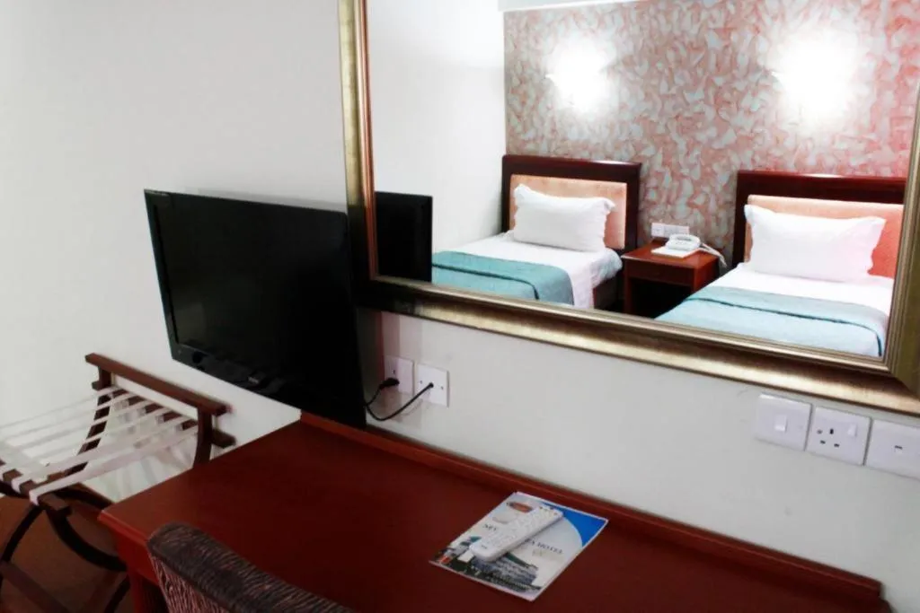 Bed in New Mwanza Hotel
