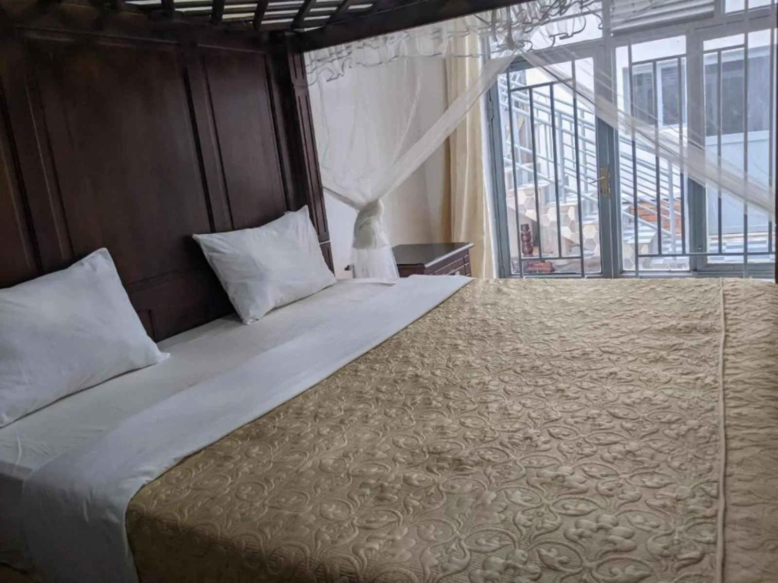 Bed in The Keza Hotel and Apartments