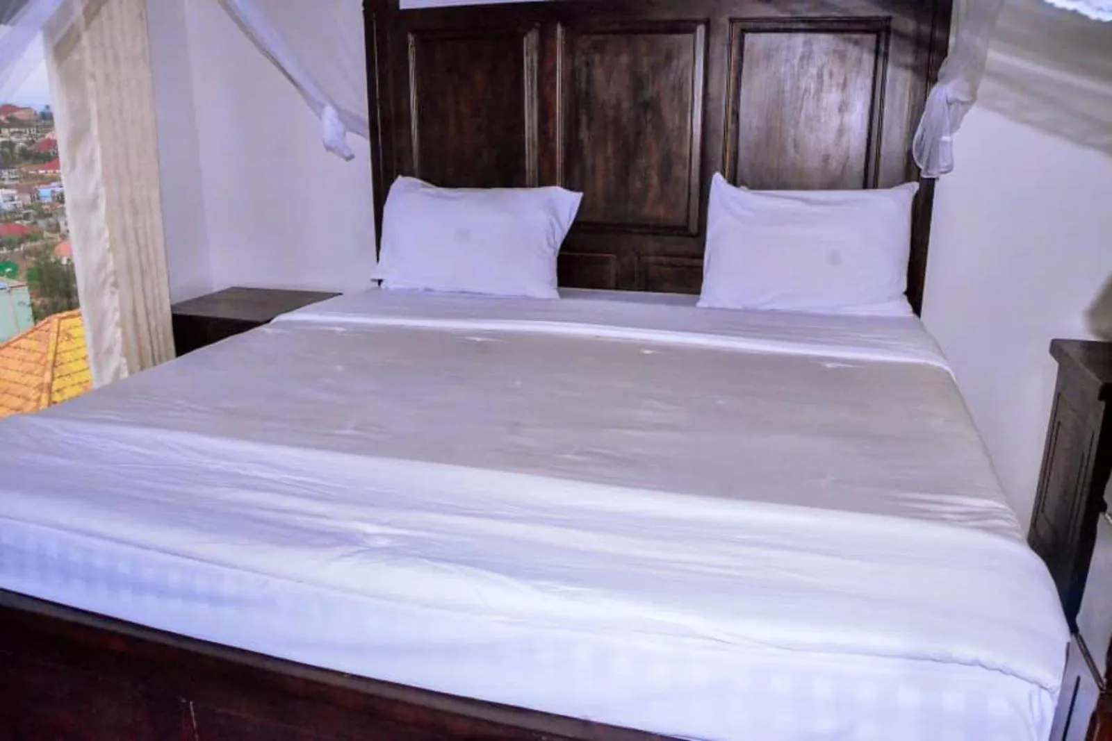 Bed in The Keza Hotel and Apartments