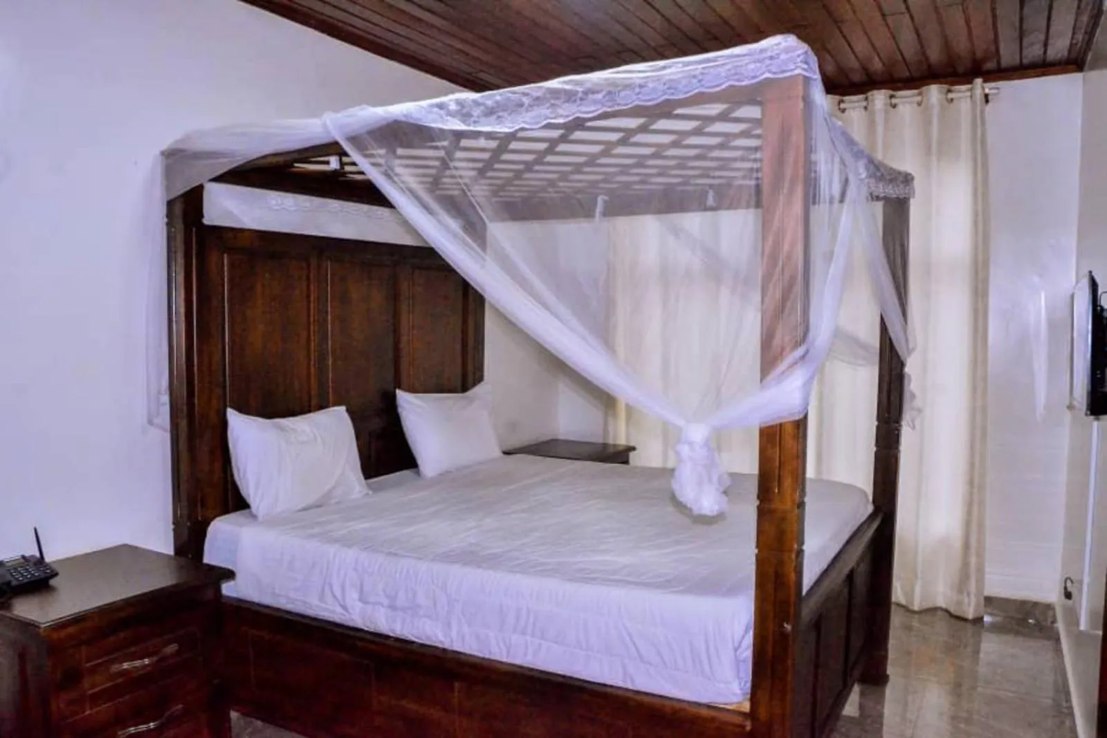 Bed in The Keza Hotel and Apartments