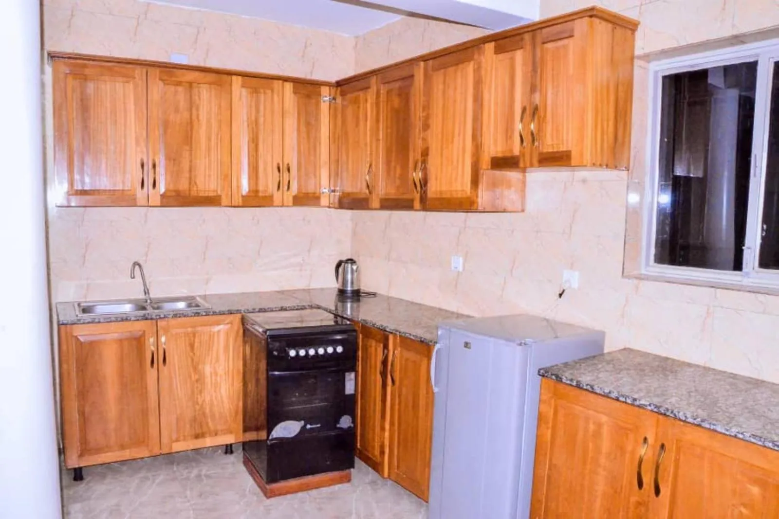 Kitchen or kitchenette in The Keza Hotel and Apartments