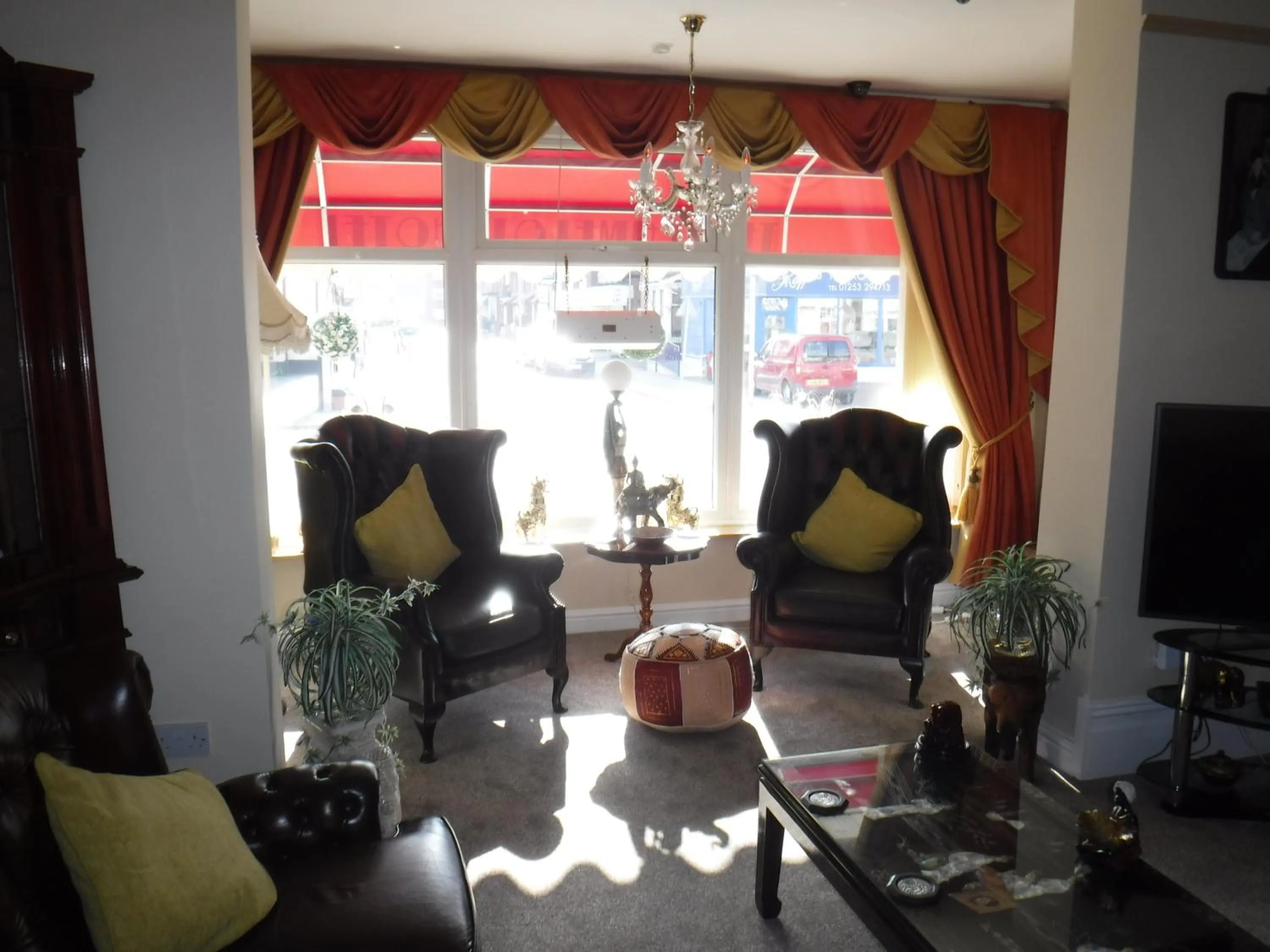 Living room in Camelot Hotel - Couples Only