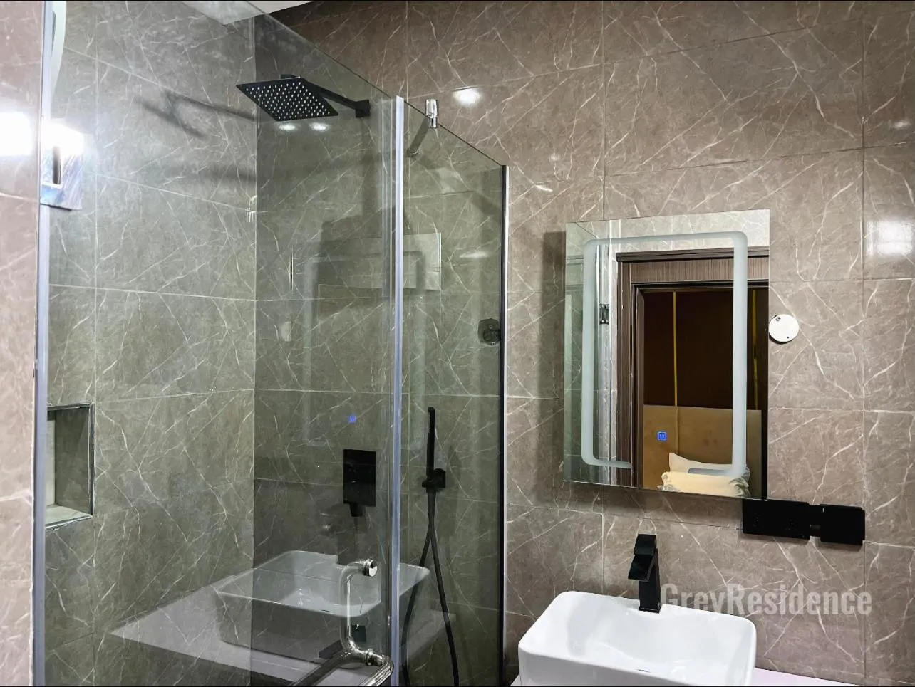 Shower in Grey Residence