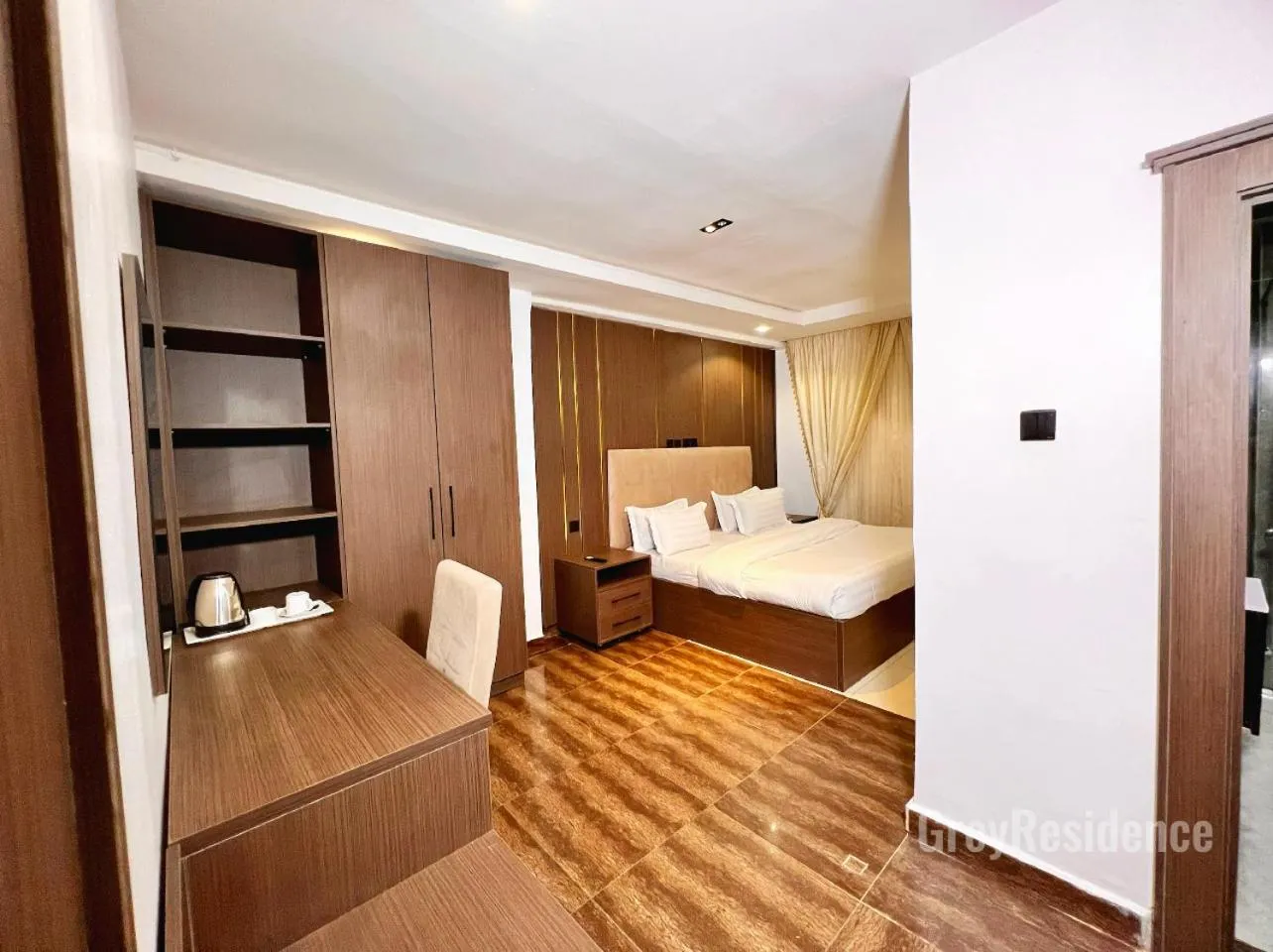 Photo of the whole room, Bed in Grey Residence