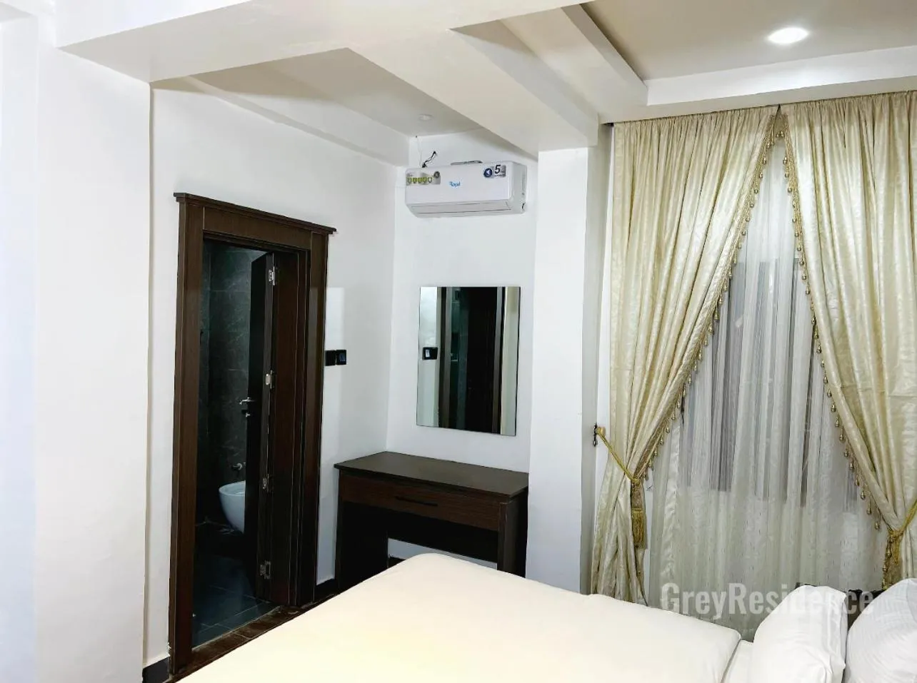 Photo of the whole room, Bed in Grey Residence