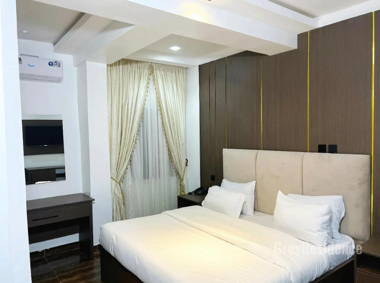 Bed in Grey Residence