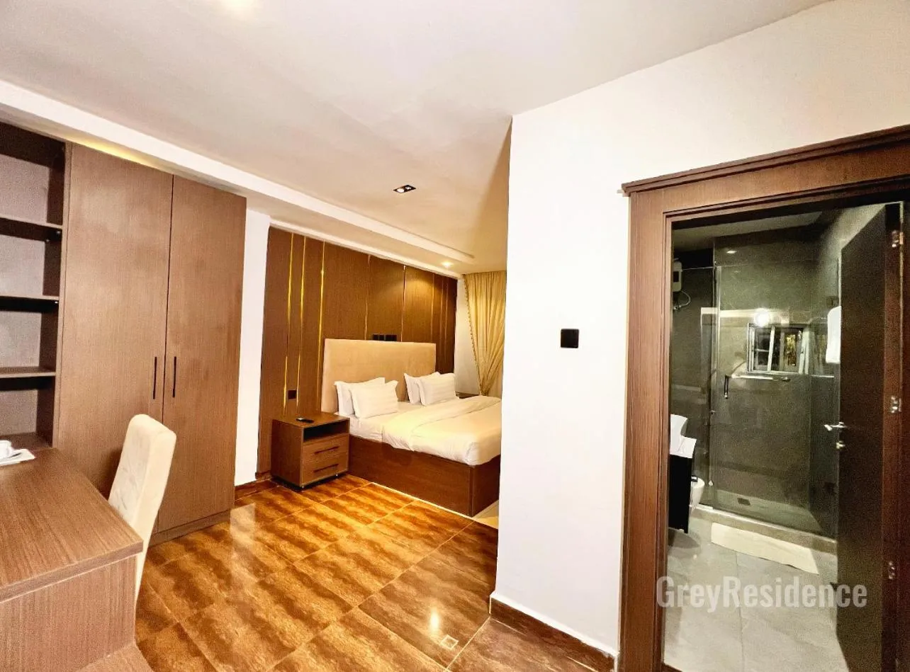 Photo of the whole room, Bed in Grey Residence