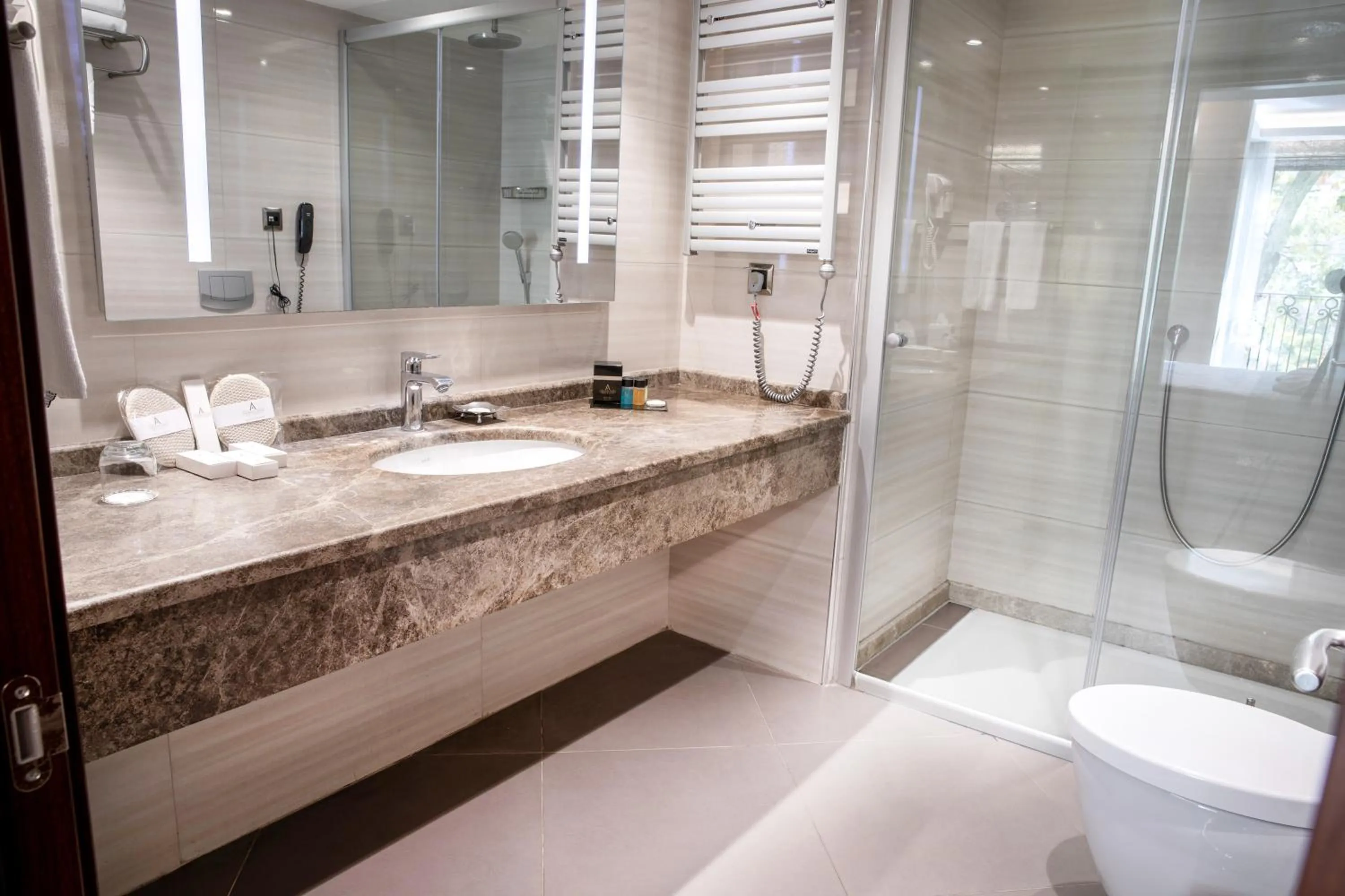 Bathroom in Grand Aras Hotel & Suites