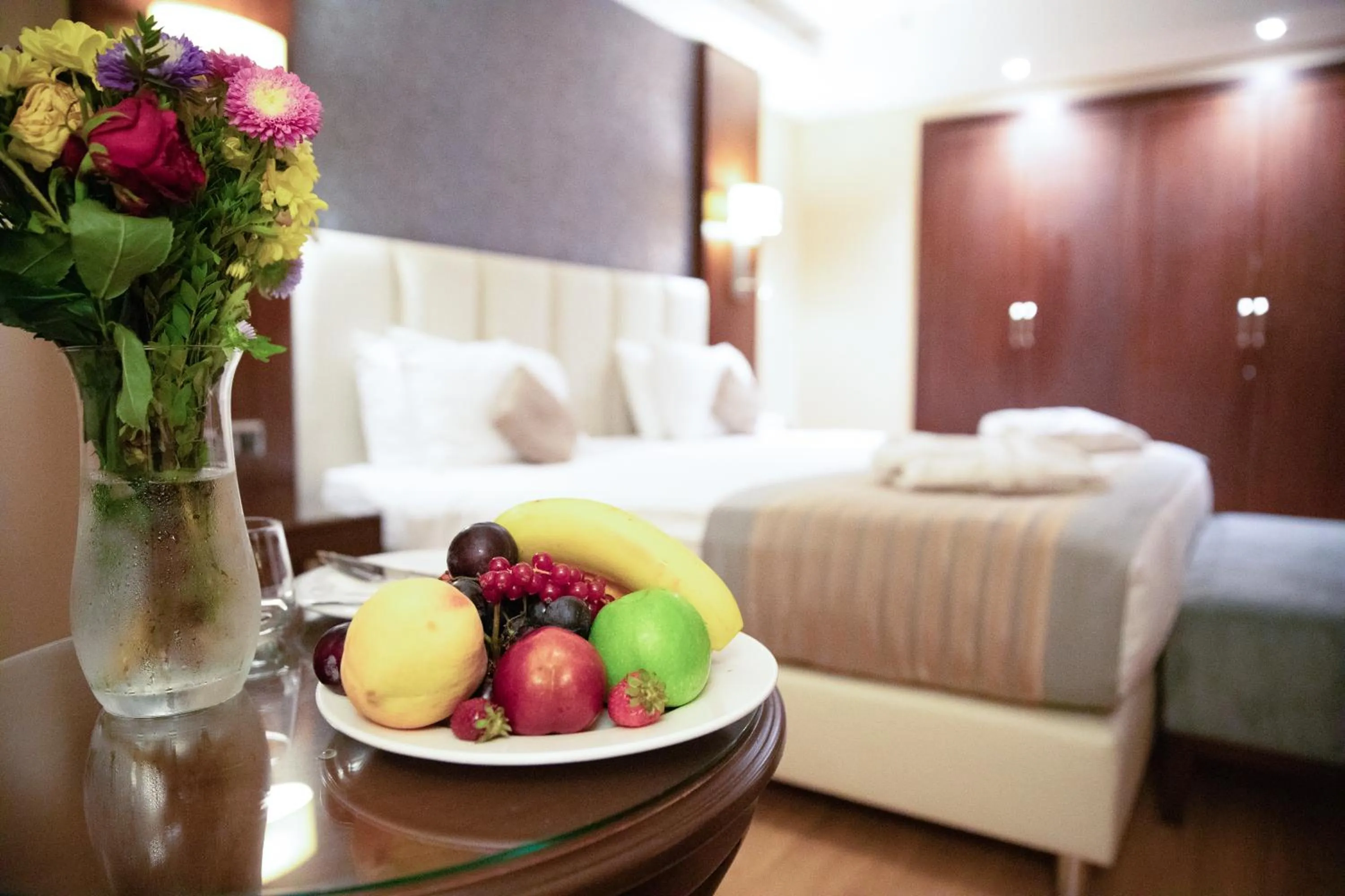 room service, Bed in Grand Aras Hotel & Suites