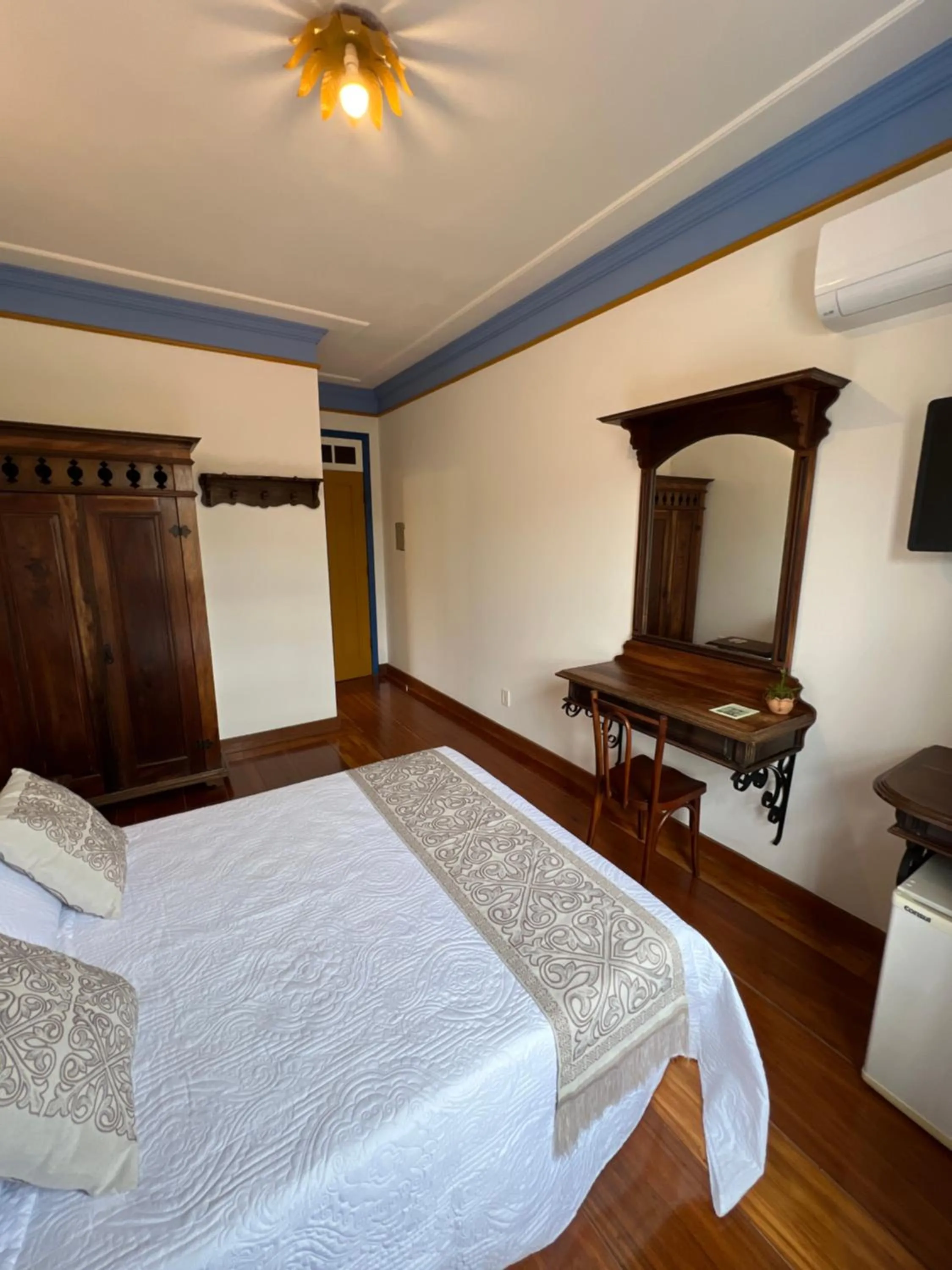 Bed in Pousada Sinhá Olímpia