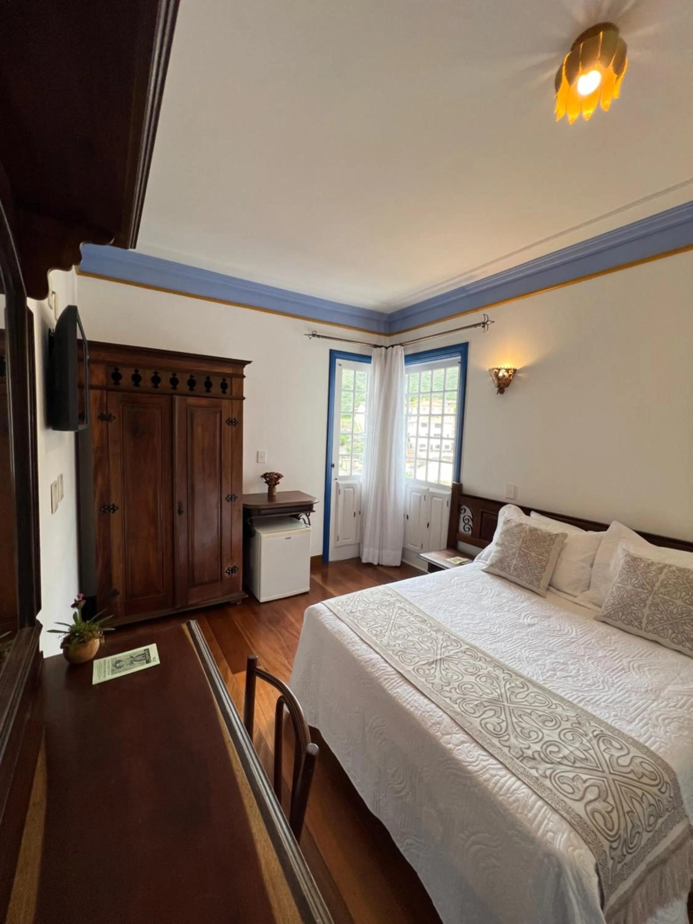 Bed in Pousada Sinhá Olímpia