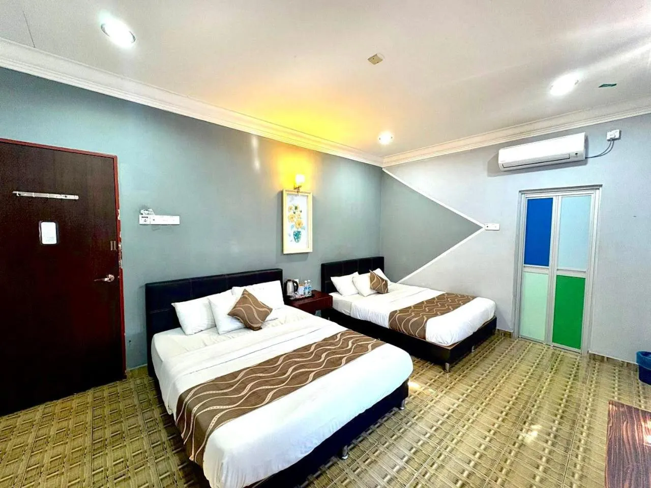 Bed in DAILY INN HOTEL