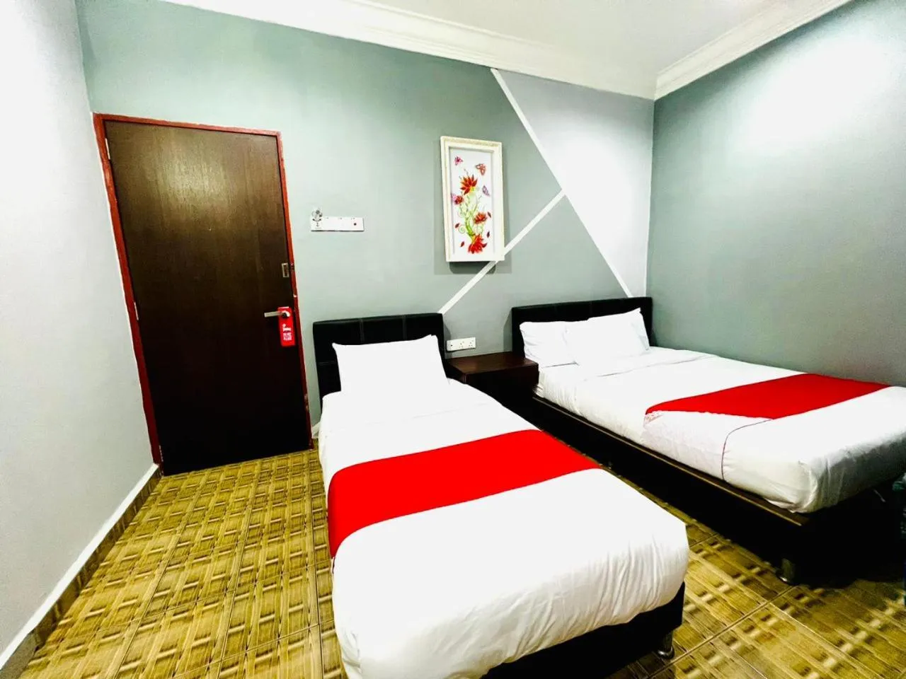 Bed in DAILY INN HOTEL